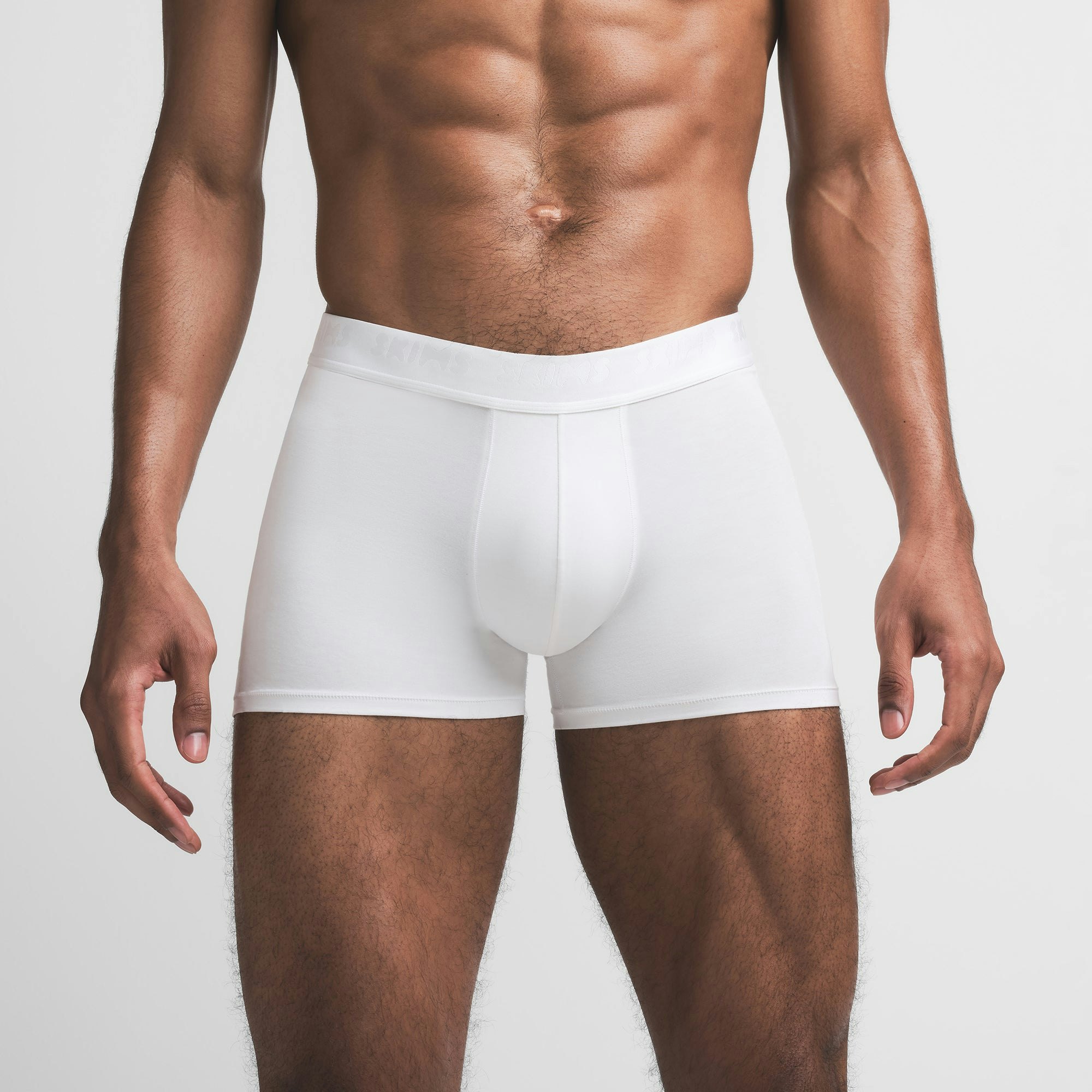 SKIMS STRETCH MENS 3" BOXER BRIEF | CHALK ON A MODEL FRONT VIEW @ | FOCUS: 0.9, 0.1, 0.7