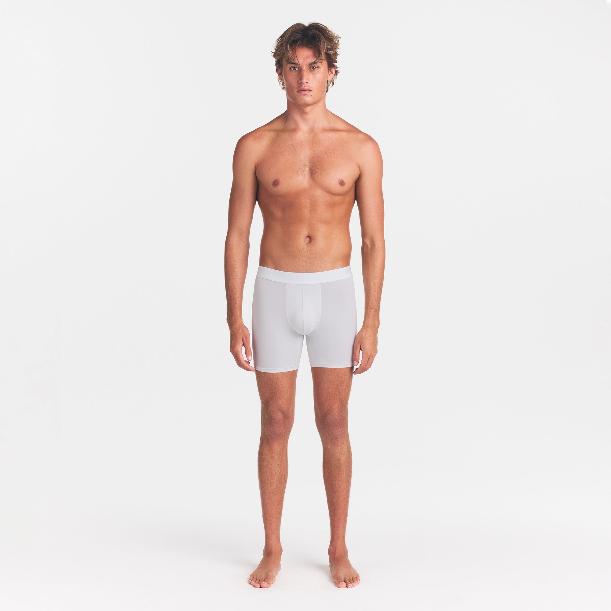 SKIMS STRETCH MENS 3" BOXER BRIEF | CHALK ON MODEL FRONT VIEW @ | FOCUS: 0.0, 1.0, 0.9