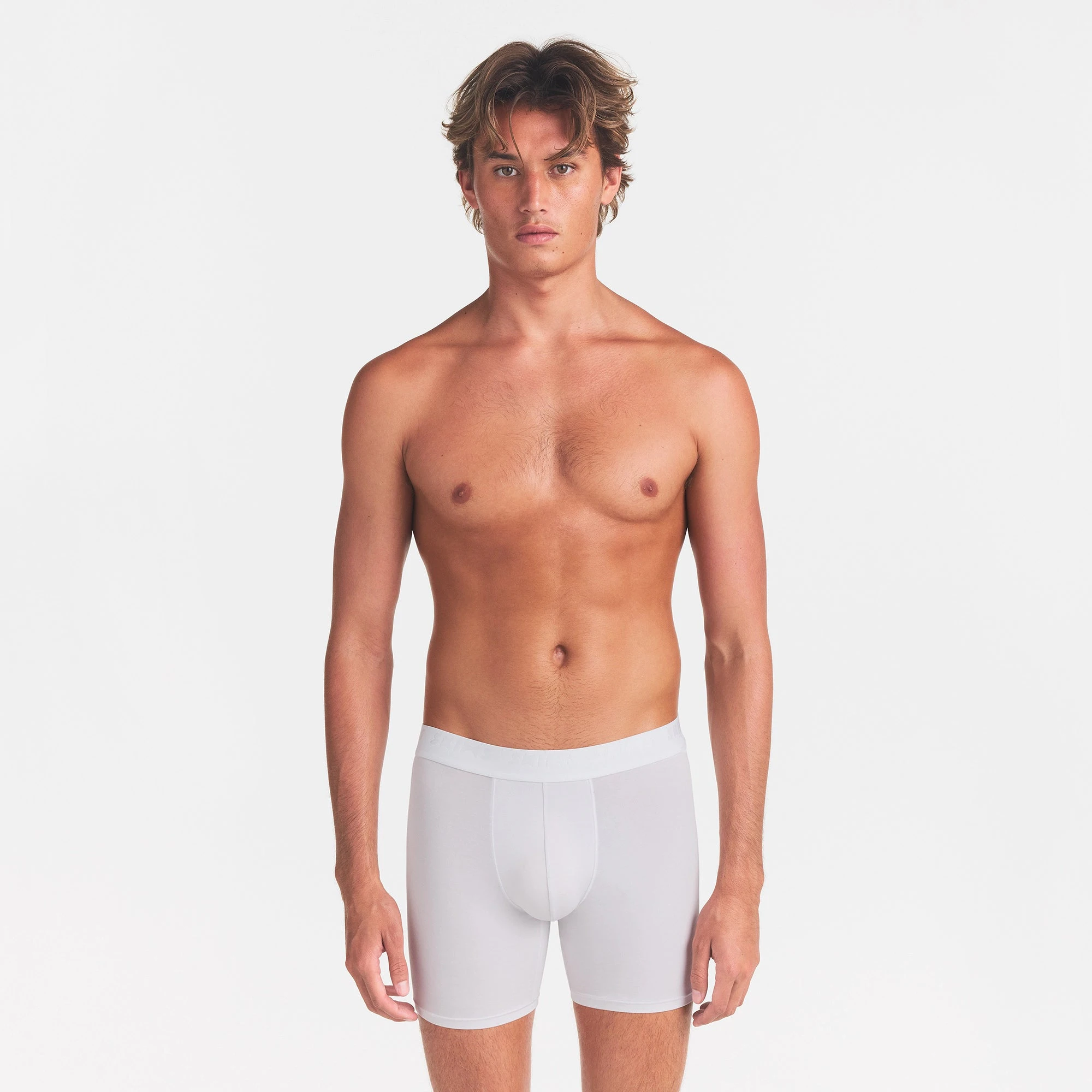 SKIMS STRETCH MENS 3" BOXER BRIEF | CHALK ON A MODEL FRONT VIEW