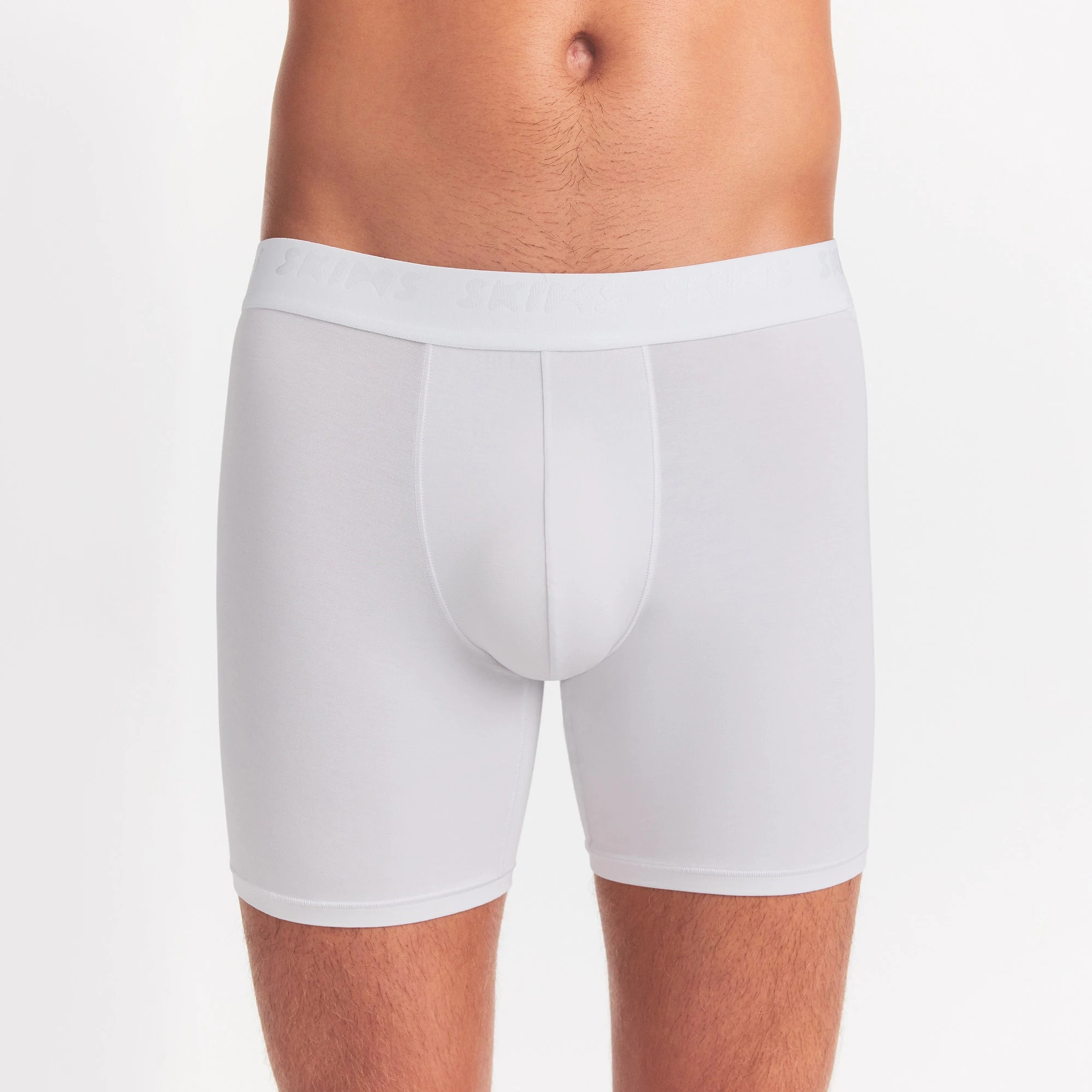 SKIMS STRETCH MENS 3" BOXER BRIEF | CHALK ON A MODEL FRONT VIEW