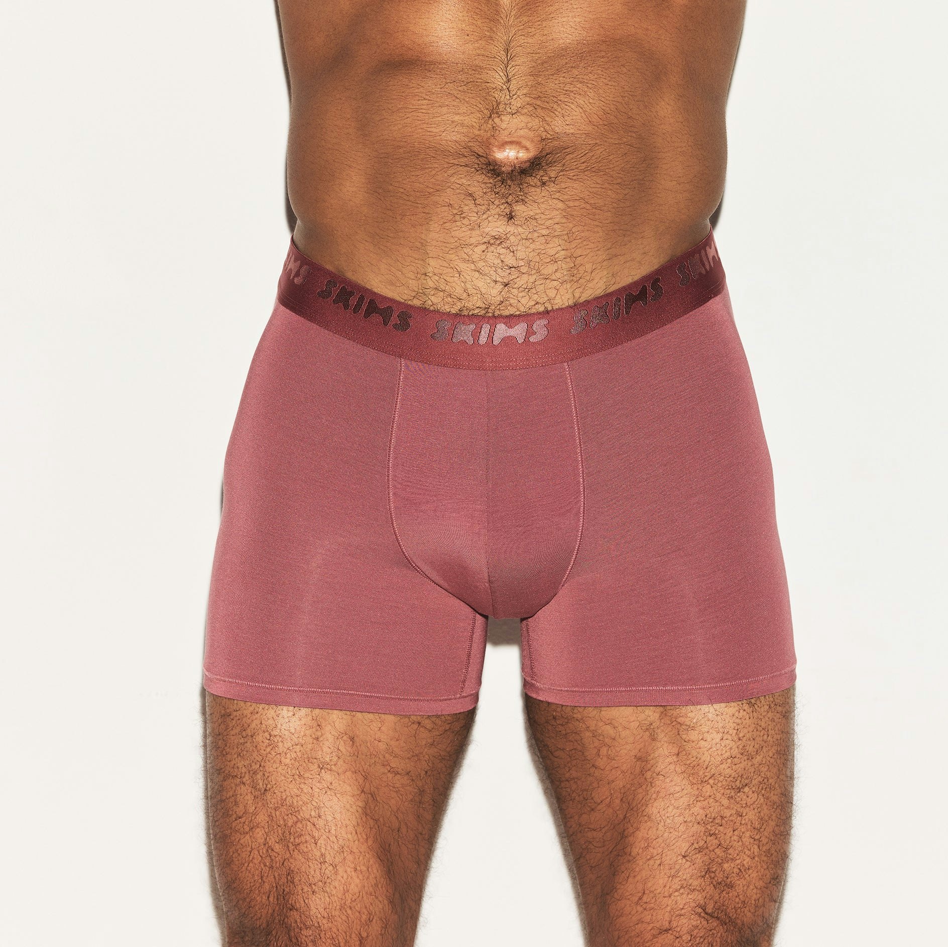 SKIMS STRETCH MENS 3 INCH BOXER BRIEF | CORDOVAN ON A MODEL FRONT VIEW | FOCUS: 0.0, 1.0, 0.9