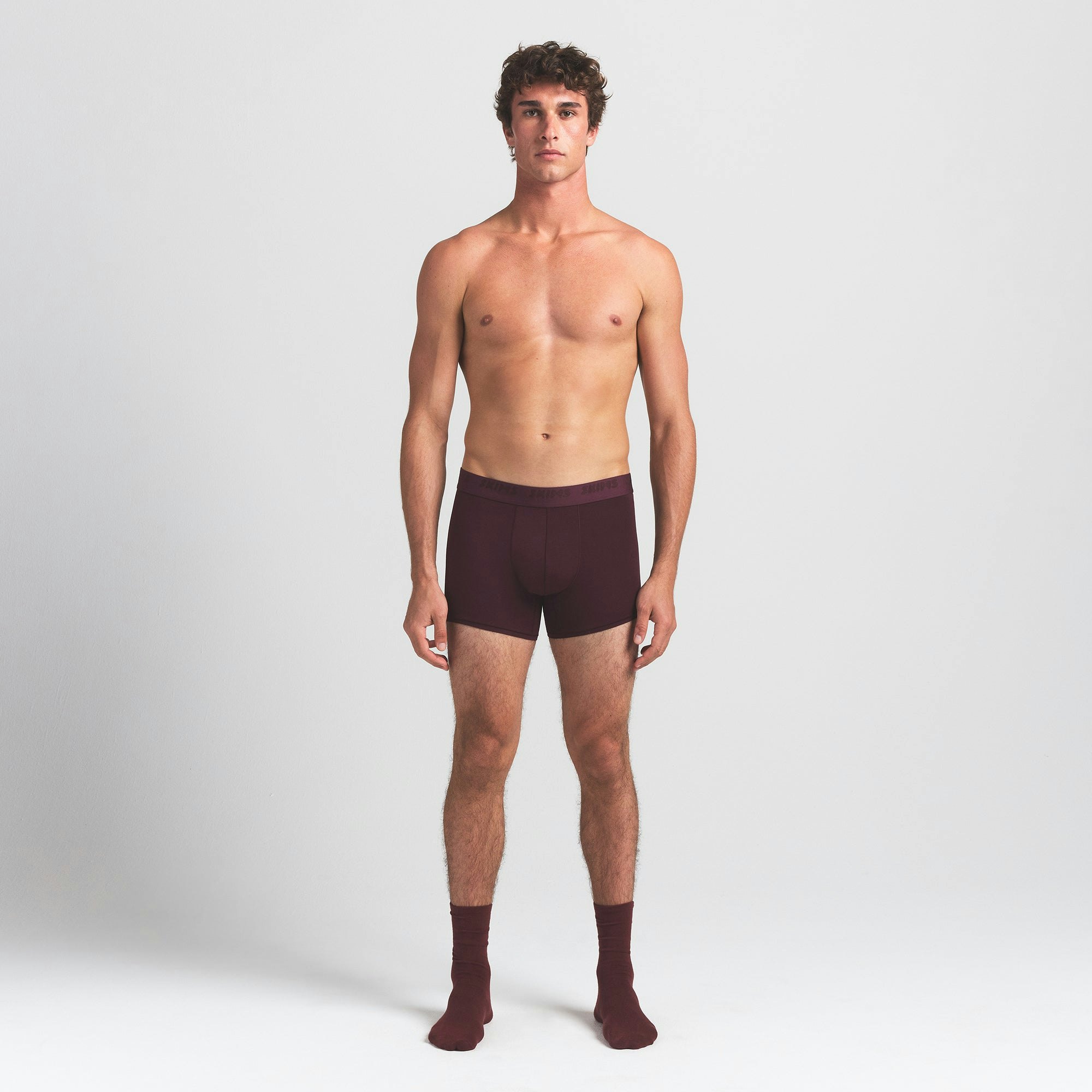SKIMS STRETCH MENS 3" BOXER BRIEF | CURRANT ON A MODEL FRONT VIEW @ | FOCUS: 0.0, 1.0, 0.9