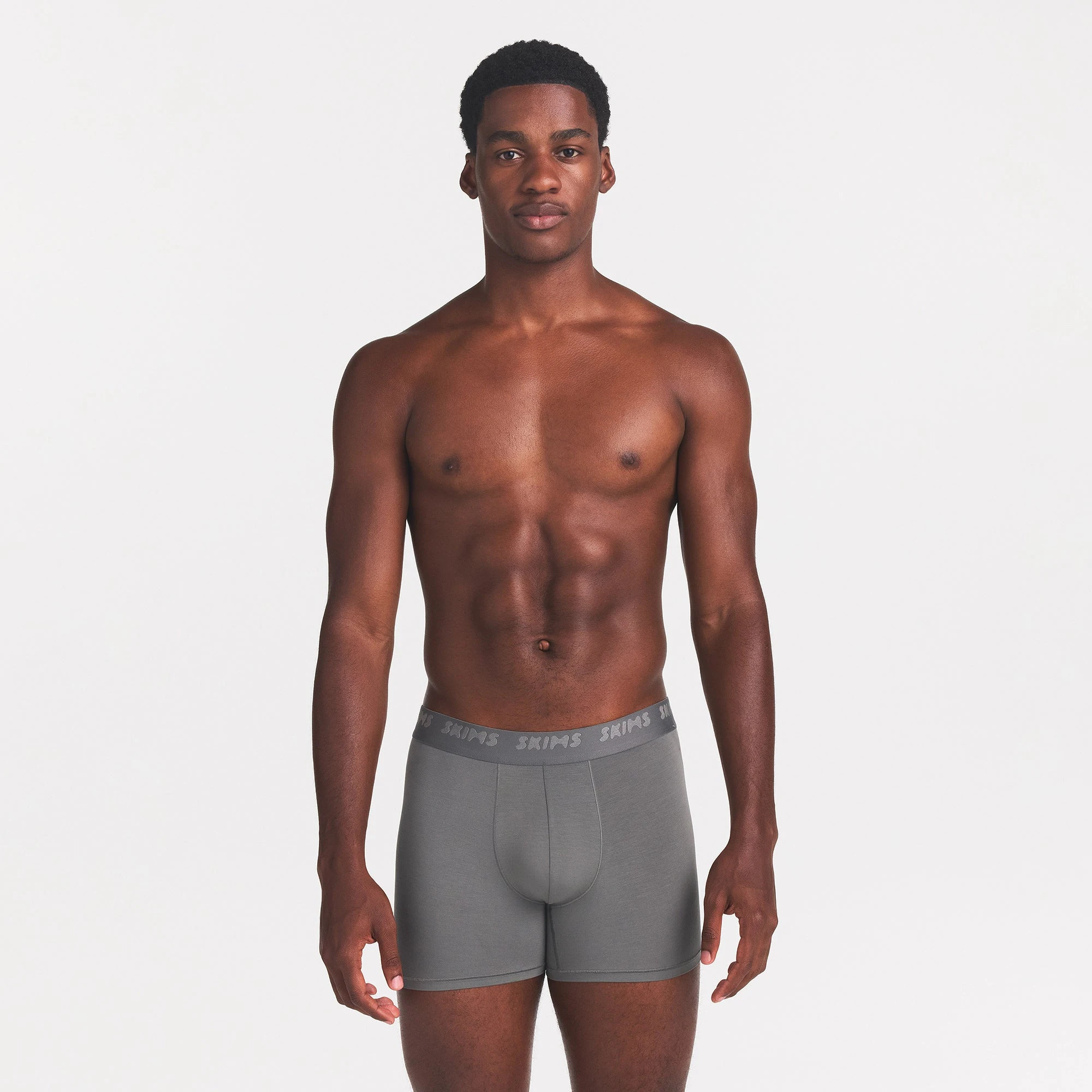 SKIMS STRETCH MENS 3" BOXER BRIEF | GUNMETAL ON A MODEL FRONT VIEW