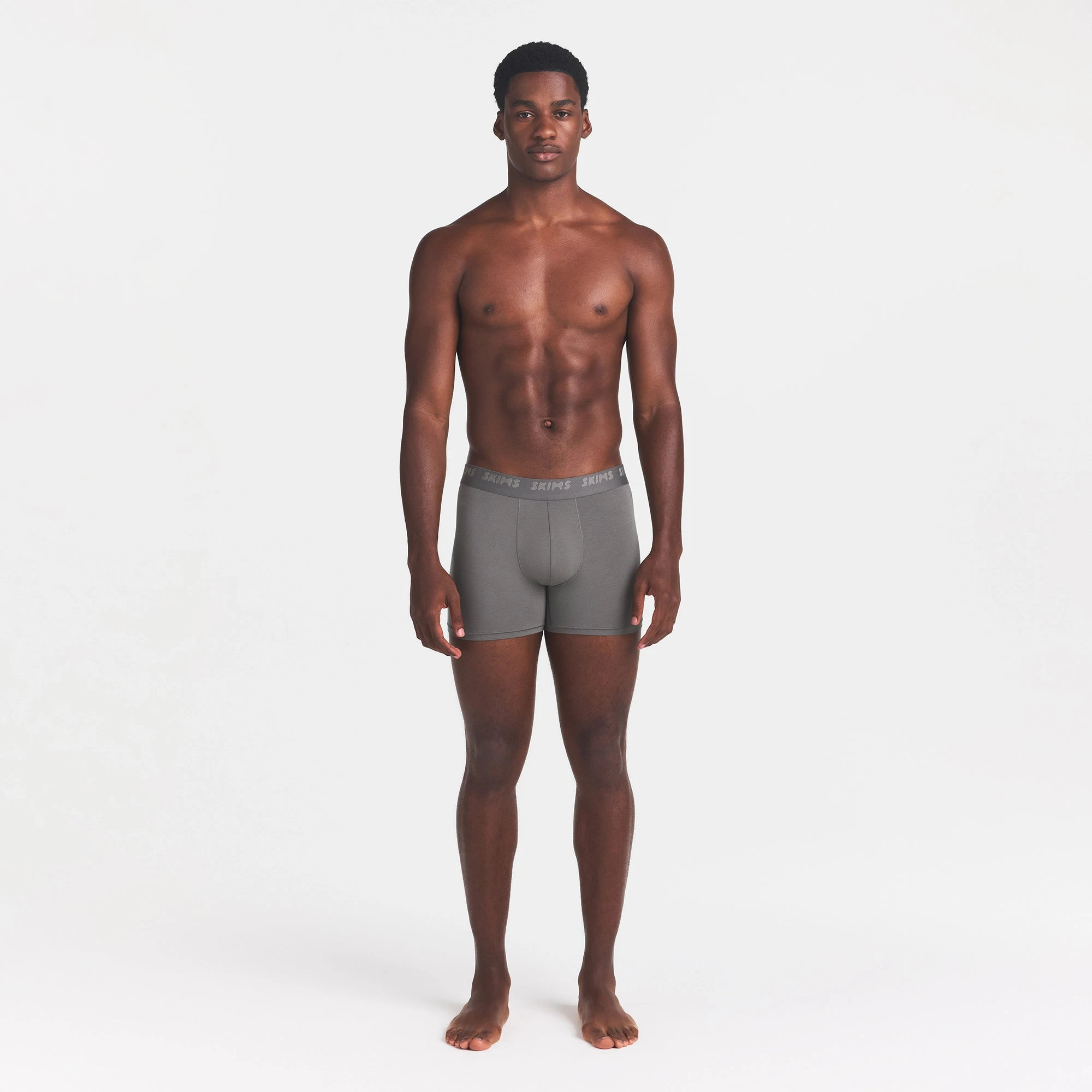 SKIMS STRETCH MENS 3" BOXER BRIEF | GUNMETAL ON A MODEL FRONT VIEW @ | FOCUS: 0.0, 1.0, 0.9