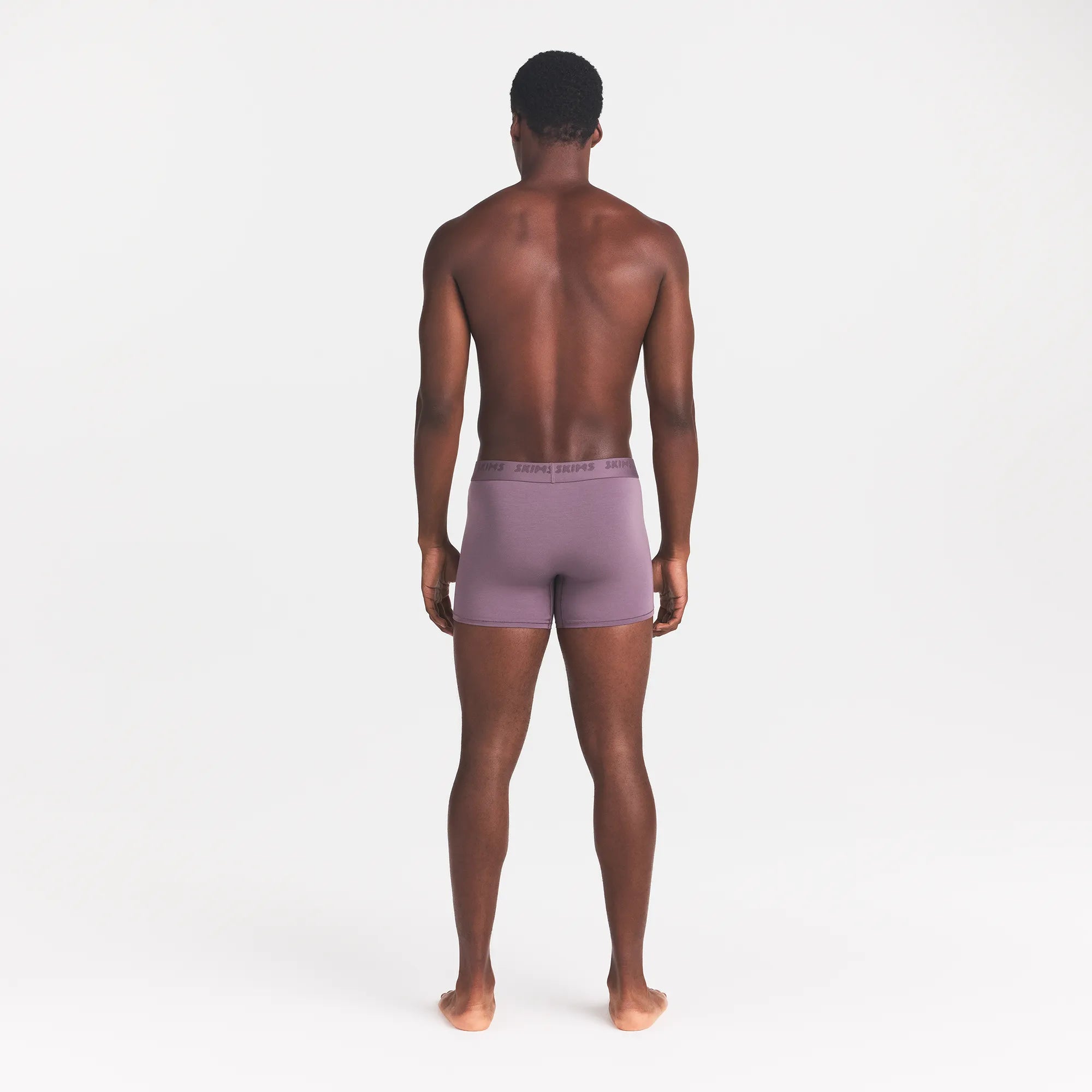 SKIMS STRETCH MENS 3" BOXER BRIEF | IRIS ON A MODEL BACK VIEW @ | FOCUS: 0.0, 1.0, 0.9
