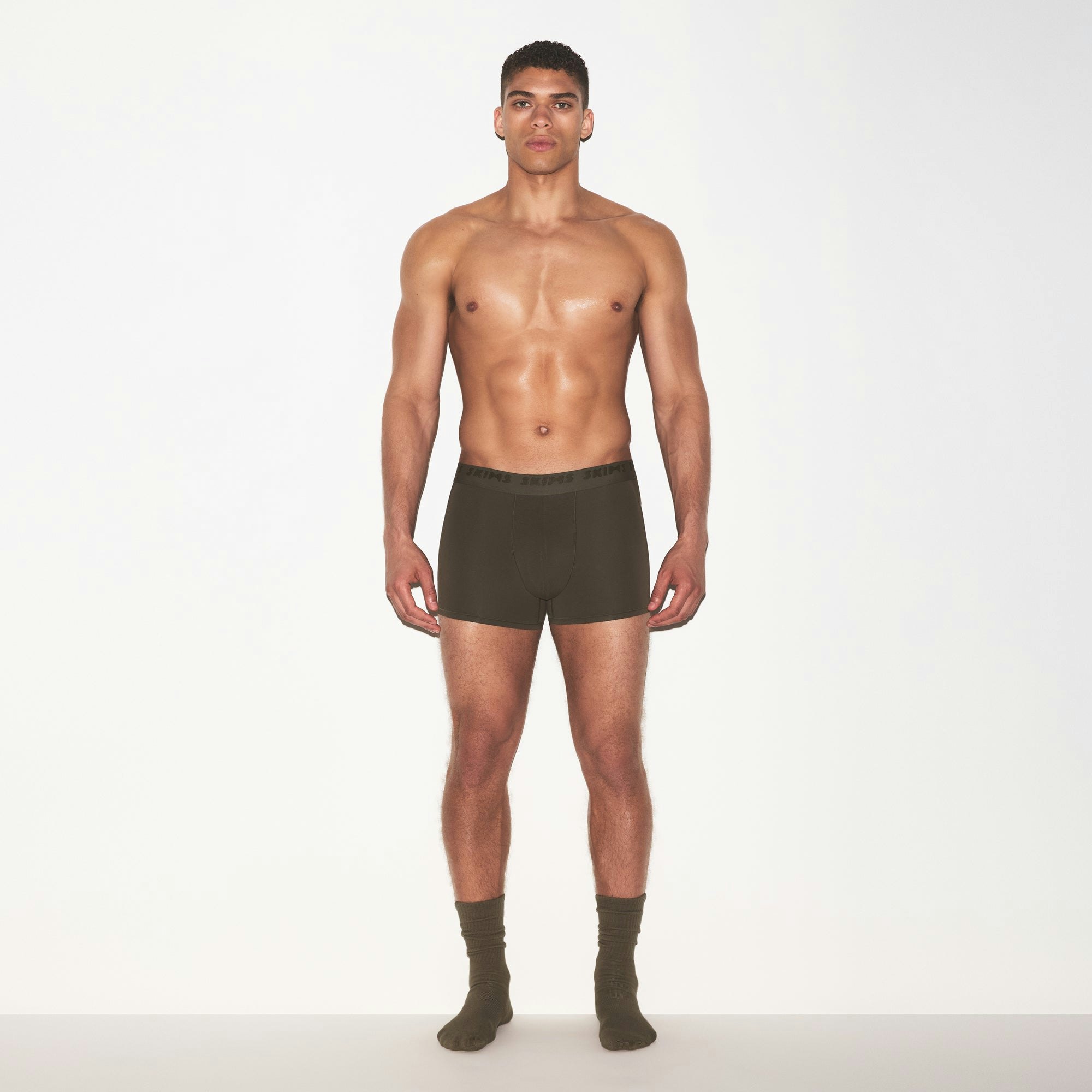 SKIMS STRETCH MENS 3" BOXER BRIEF | LODEN ON A MODEL FRONT VIEW @ | FOCUS: 0.0, 1.0, 0.9
