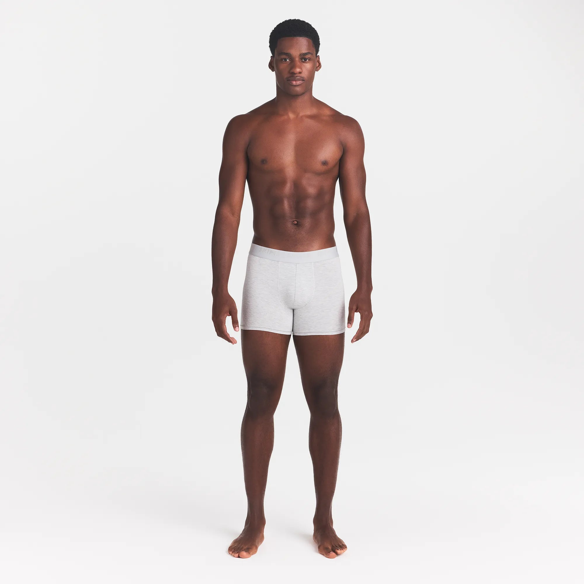 SKIMS STRETCH MENS 3" BOXER BRIEF | LIGHT HEATHER GREY ON A MODEL FRONT VIEW @ | FOCUS: 0.0, 1.0, 0.9