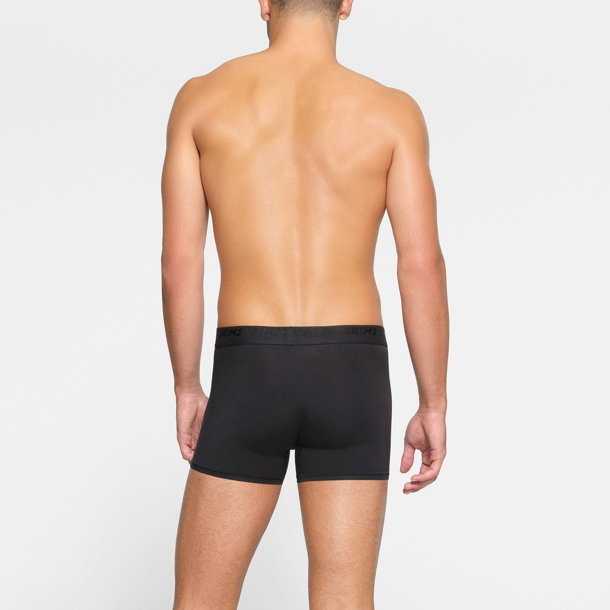 SKIMS STRETCH MENS 3" BOXER BRIEF 3-PACK ON A MODEL BACK VIEW