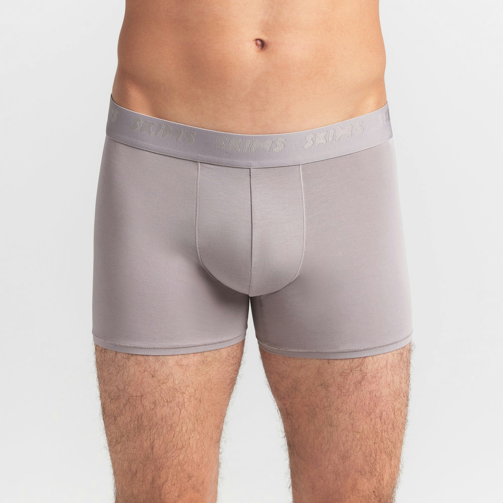 SKIMS STRETCH MENS 3" BOXER BRIEF | OYSTER ON A MODEL FRONT VIEW @ | FOCUS: 0.0, 1.0, 0.9