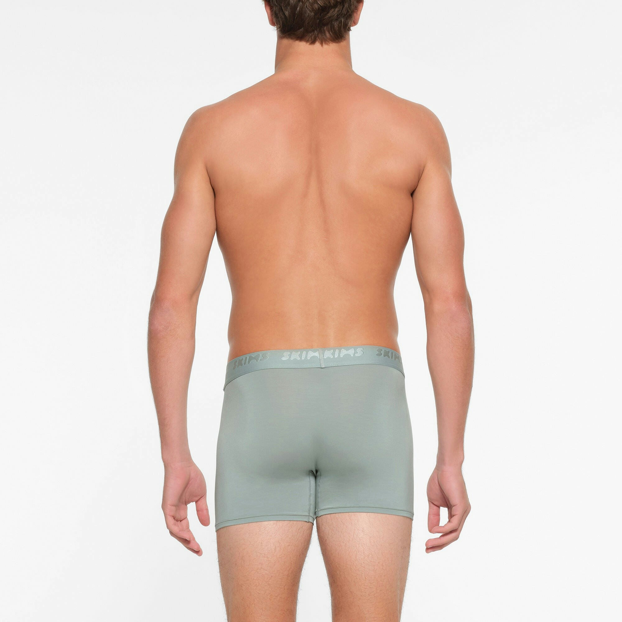 SKIMS STRETCH MENS 3" BOXER BRIEF | VAPOR ON A MODEL BACK VIEW
