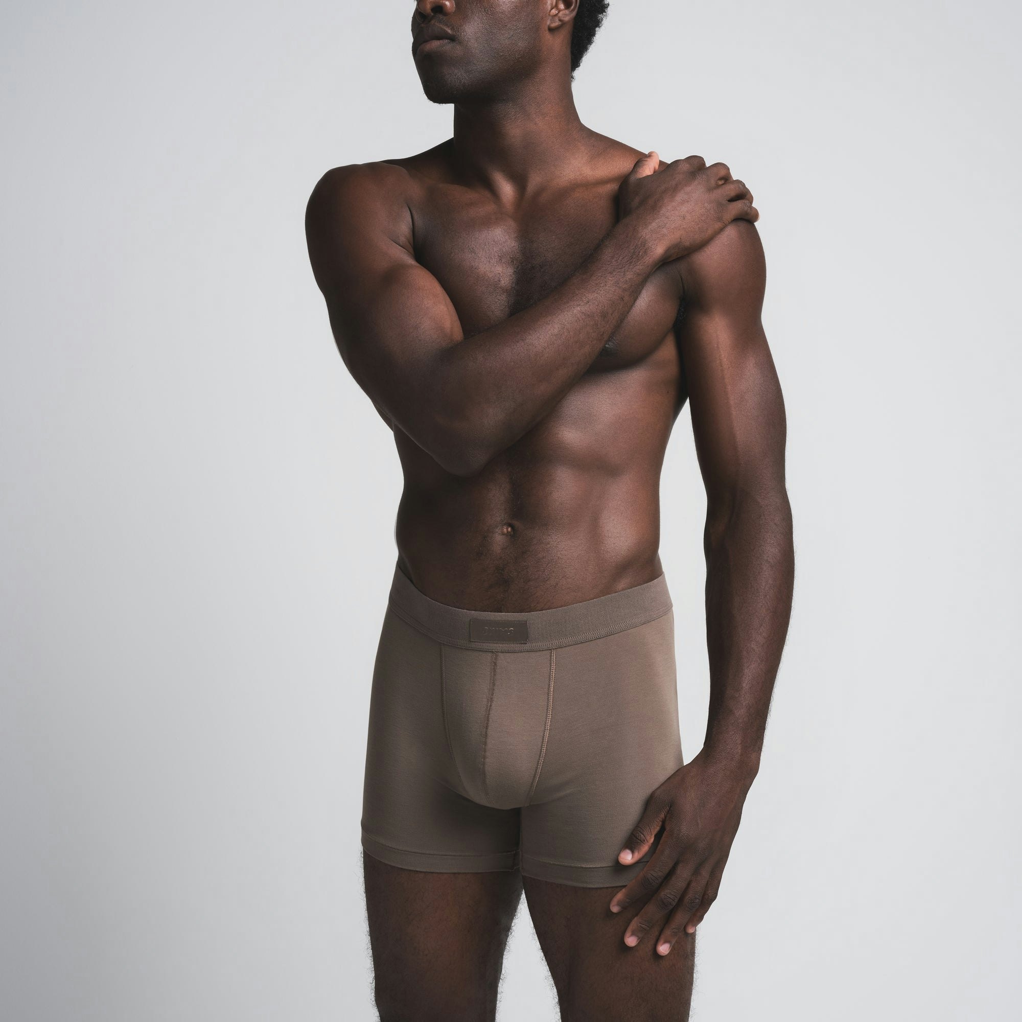 SKIMS COTTON MENS 3" BOXER BRIEF | AMETHYST (MENS BOXERS) ON A MODEL FRONT VIEW