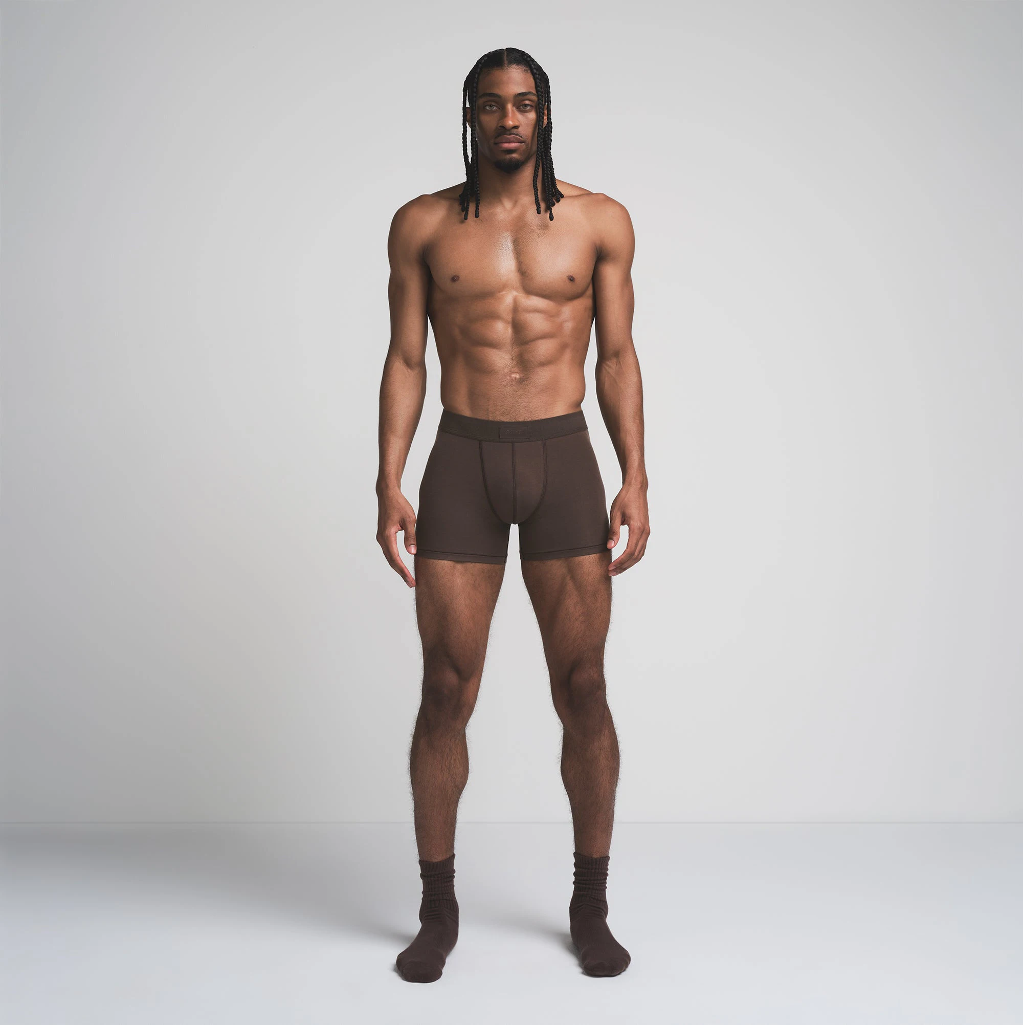SKIMS COTTON MENS 3 INCH BOXER BRIEF | DARK SEPIA ON A MODEL FRONT VIEW | FOCUS: 0.0, 1.0, 0.9