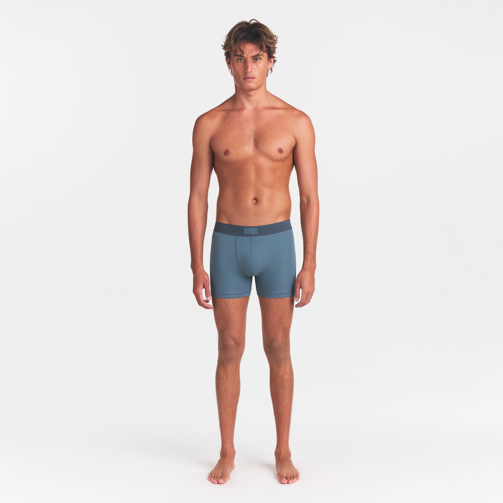 SKIMS COTTON MENS 3" BOXER BRIEF | KYANITE ON A MODEL FRONT VIEW @ | FOCUS: 0.0, 1.0, 0.9