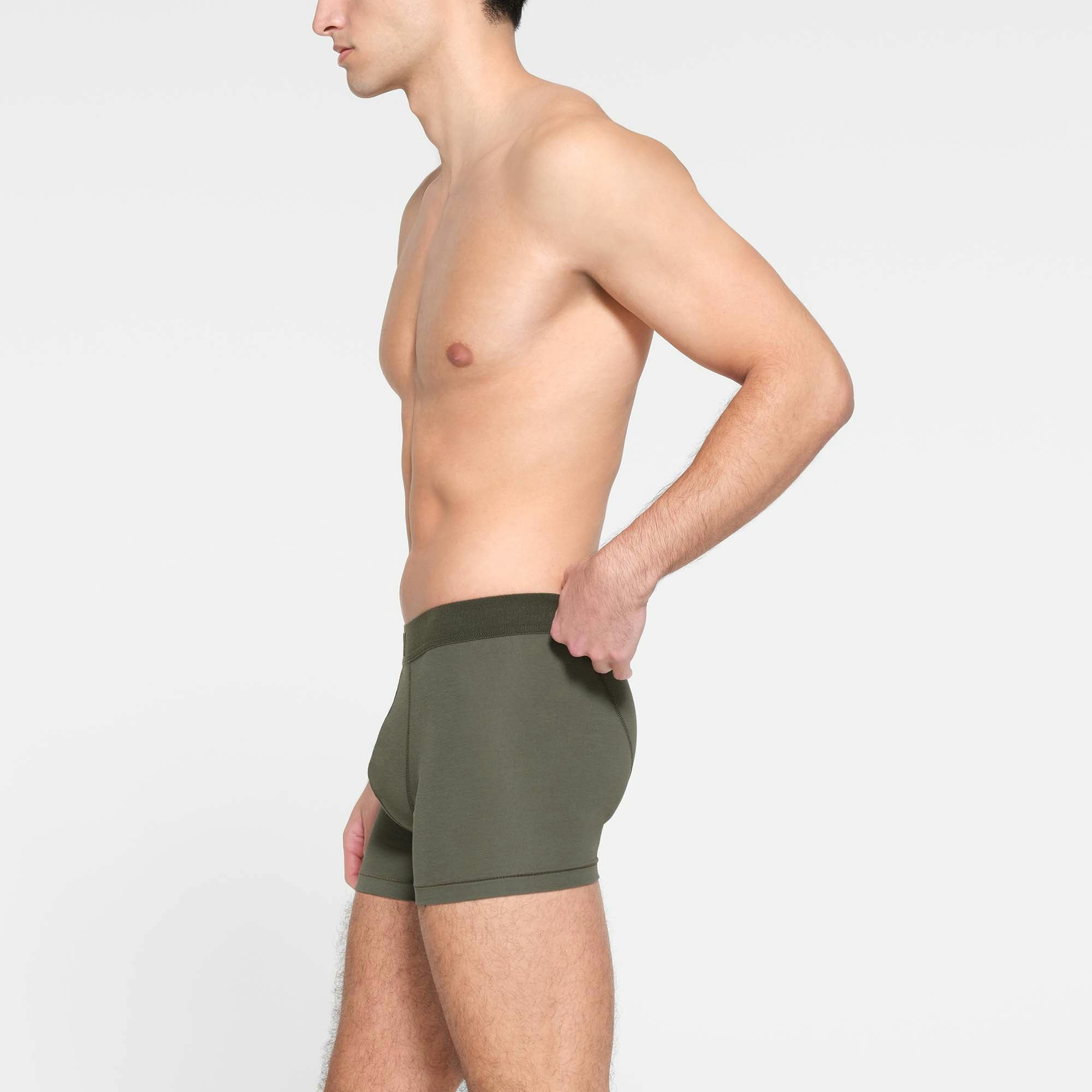 SKIMS COTTON MENS 3" BOXER BRIEF 3-PACK | MILITARY  ON A MODEL SIDE VIEW
