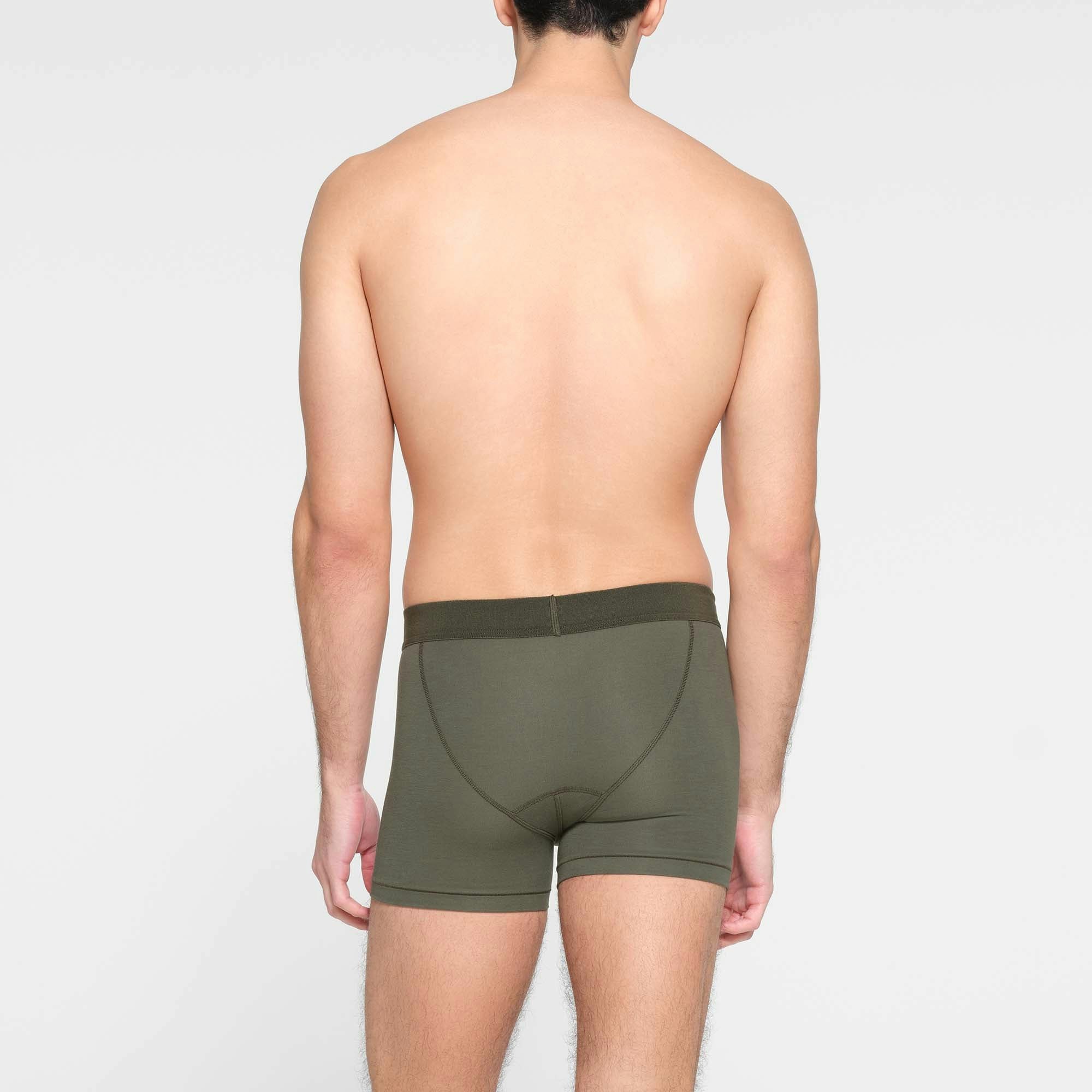 SKIMS COTTON MENS 3" BOXER BRIEF 3-PACK | MILITARY ON A MODEL BACK VIEW