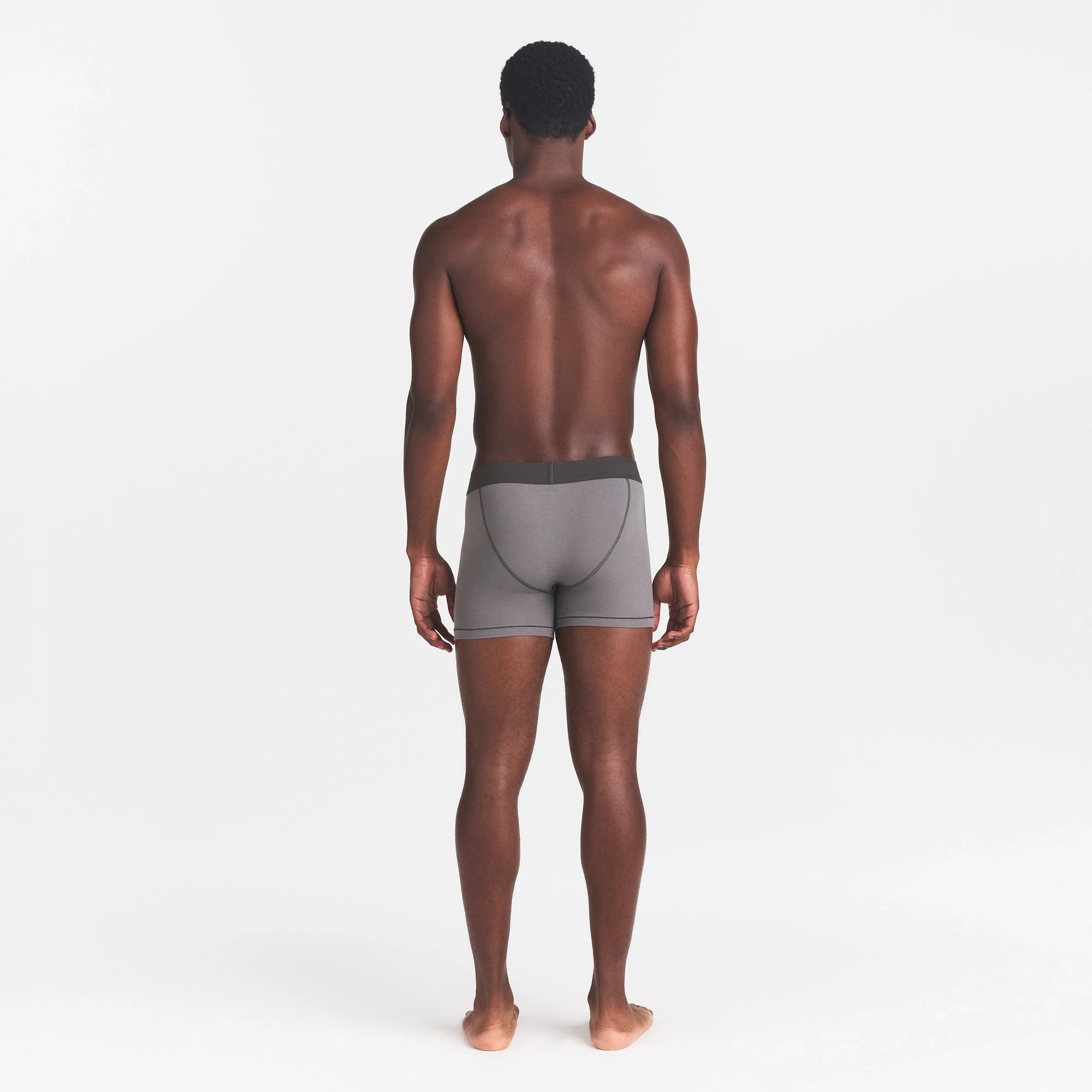SKIMS COTTON MENS 3" BOXER BRIEF | WASHED GUNMETAL ON A MODEL BACK VIEW