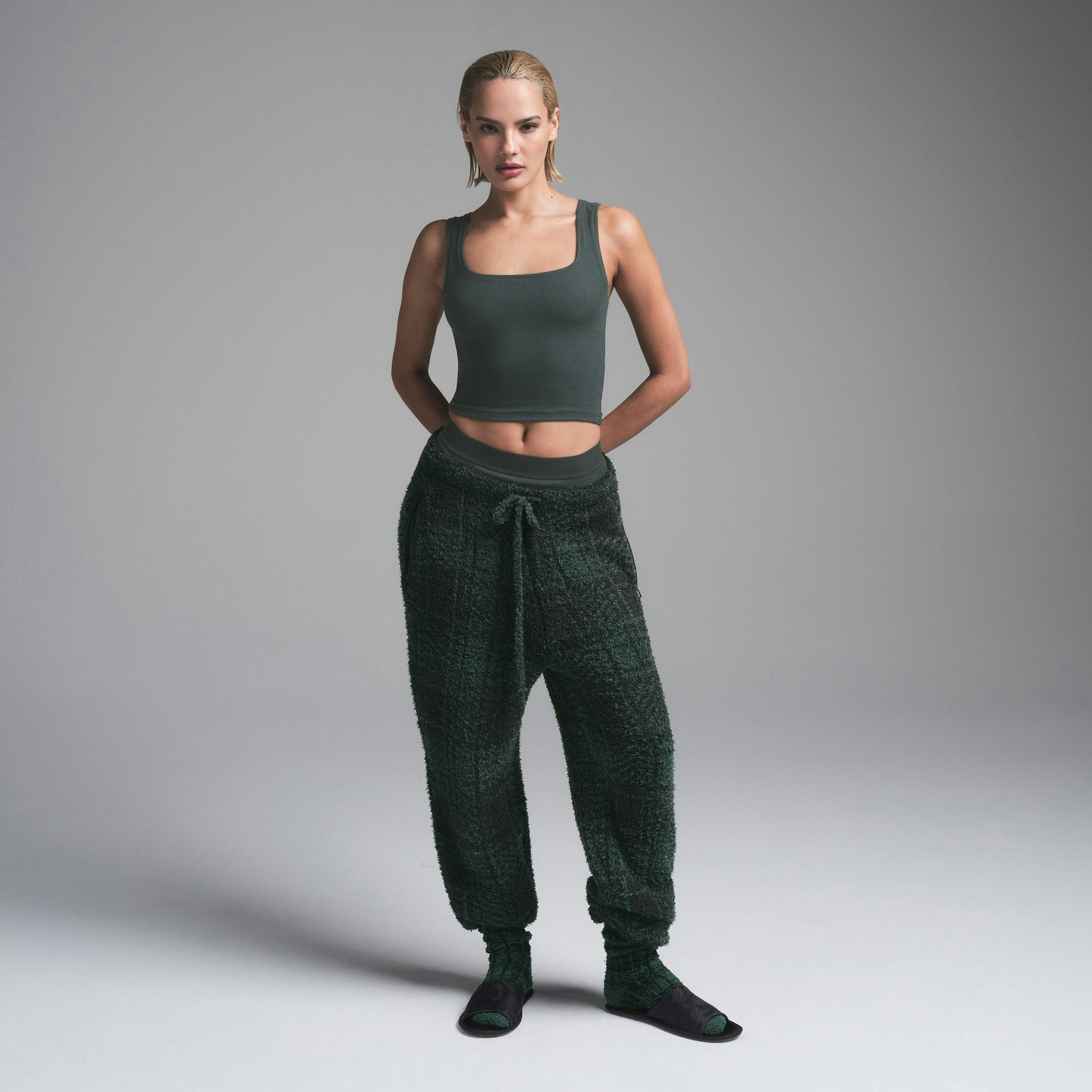 COZY KNIT UNISEX JOGGER | CYPRESS PLAID ON A MODEL FRONT VIEW | FOCUS: 0.0, 1.0, 0.9