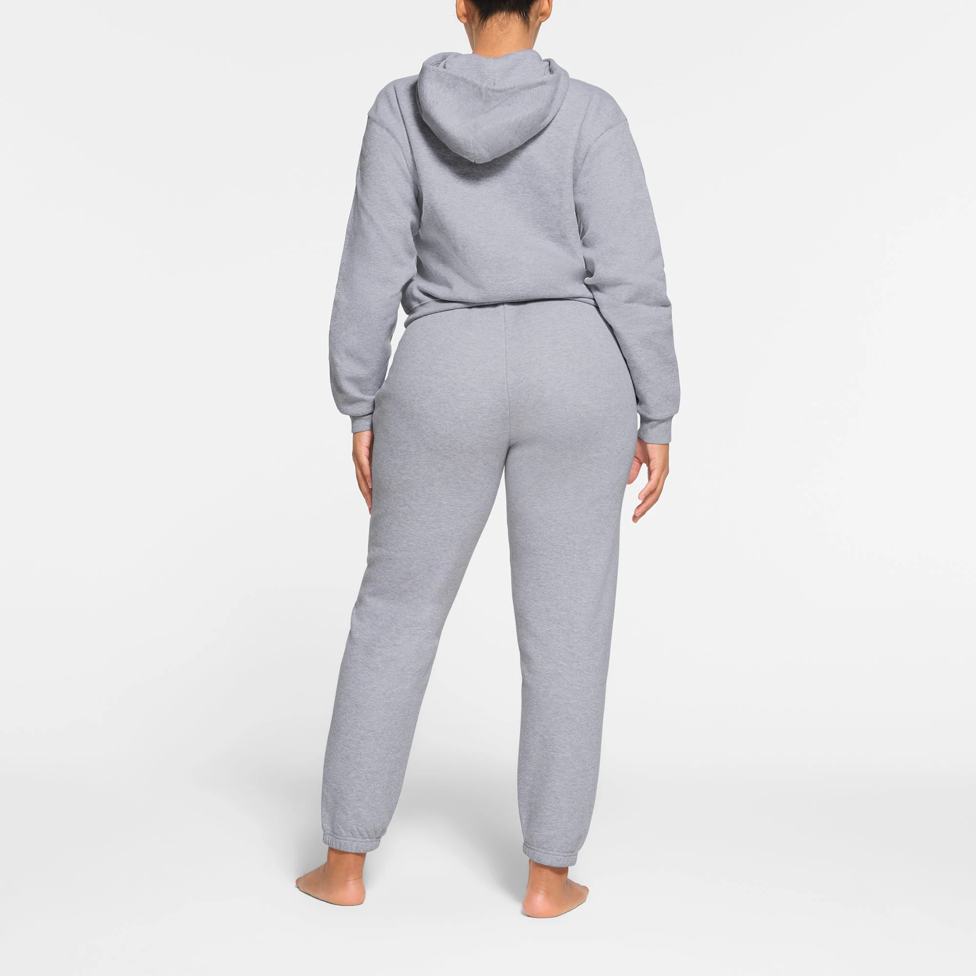 COTTON FLEECE CLASSIC JOGGER | HEATHER GREY ON A MODEL BACK VIEW