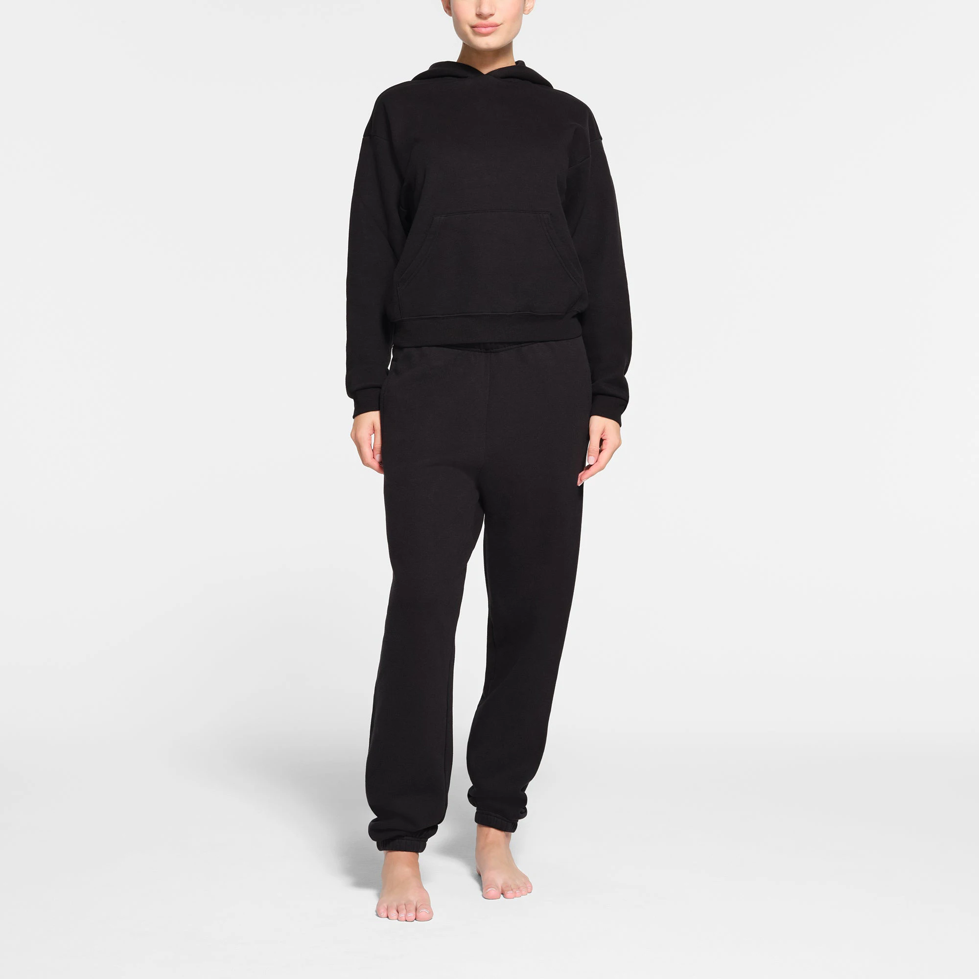 COTTON FLEECE CLASSIC JOGGER | ONYX ON A MODEL FRONT VIEW