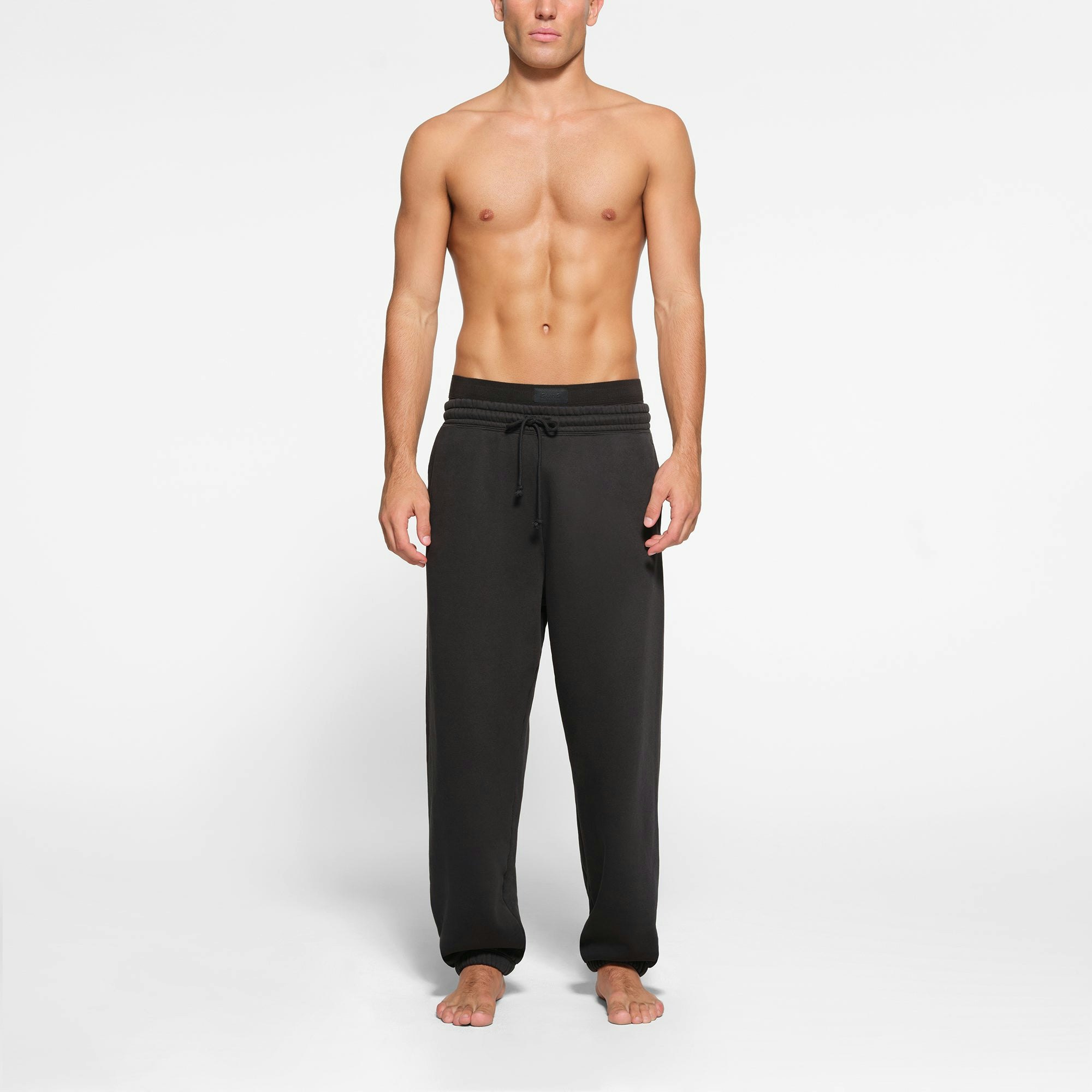 LOUNGE FLEECE MENS RELAXED JOGGER | WASHED ONYX ON A MODEL FRONT VIEW