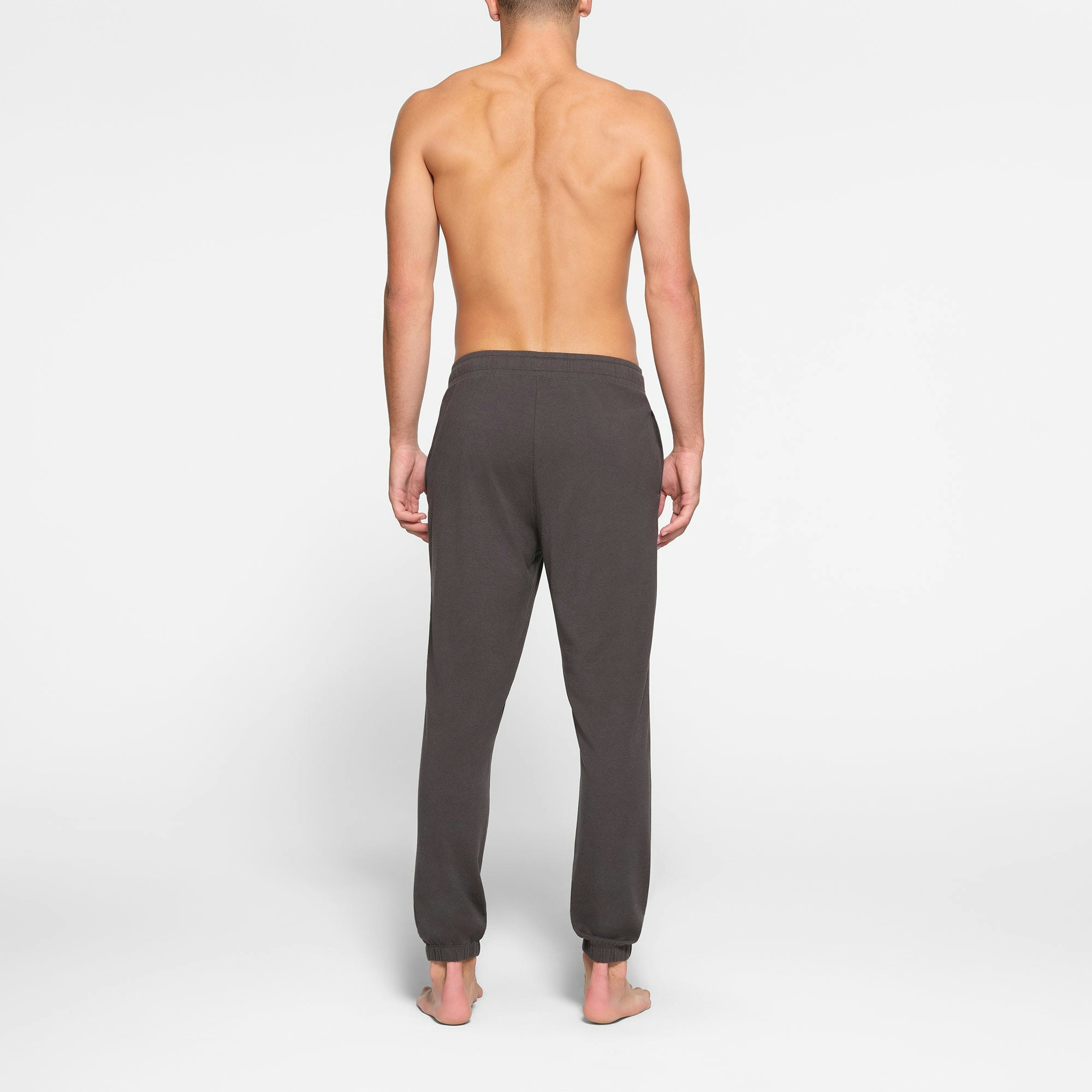 LOUNGE JERSEY MENS JOGGER | ASH ON A MODEL BACK VIEW @ | FOCUS: 0.9, 0.1, 0.7