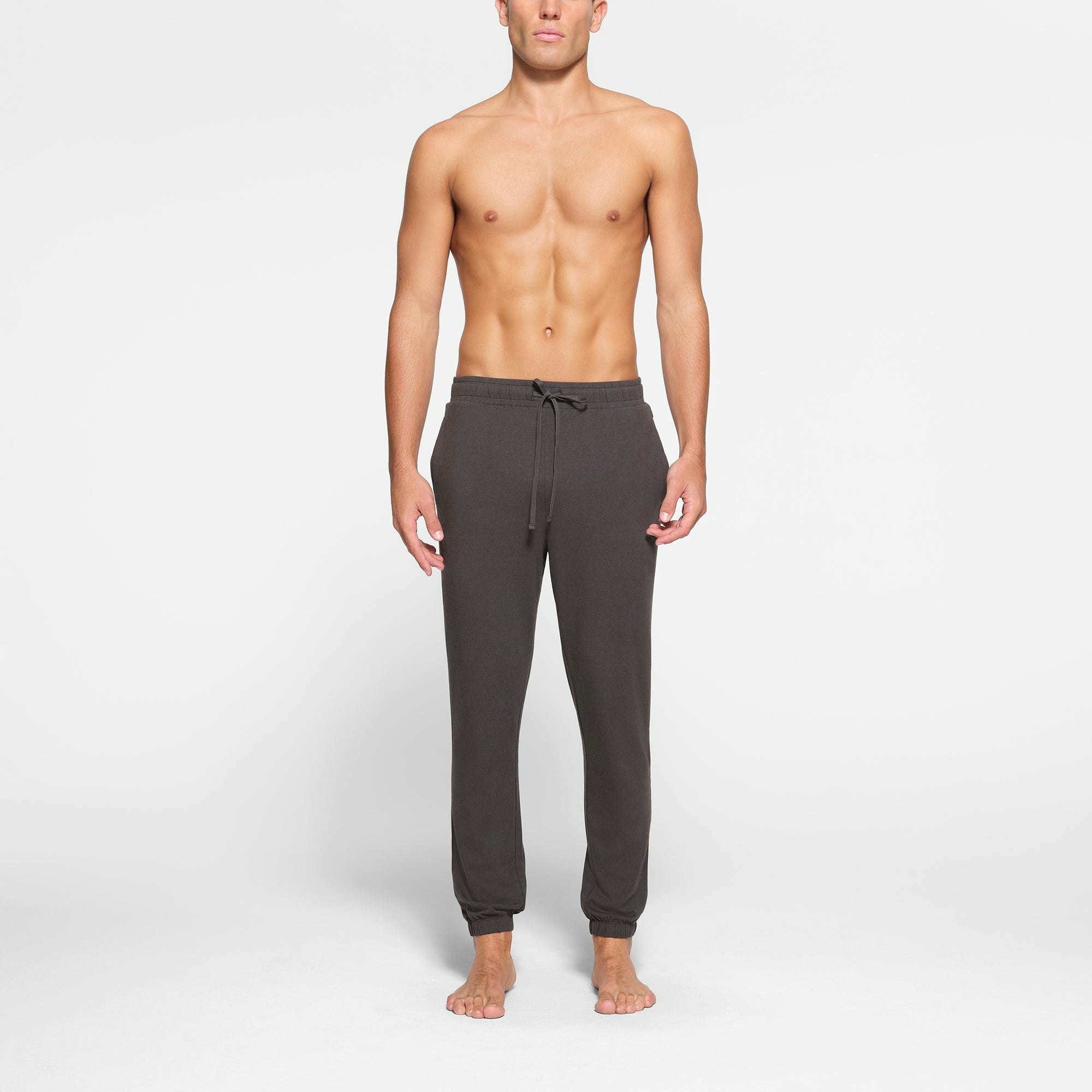 LOUNGE JERSEY MENS JOGGER | ASH ON A MODEL FRONT VIEW @ | FOCUS: 0.9, 0.1, 0.7