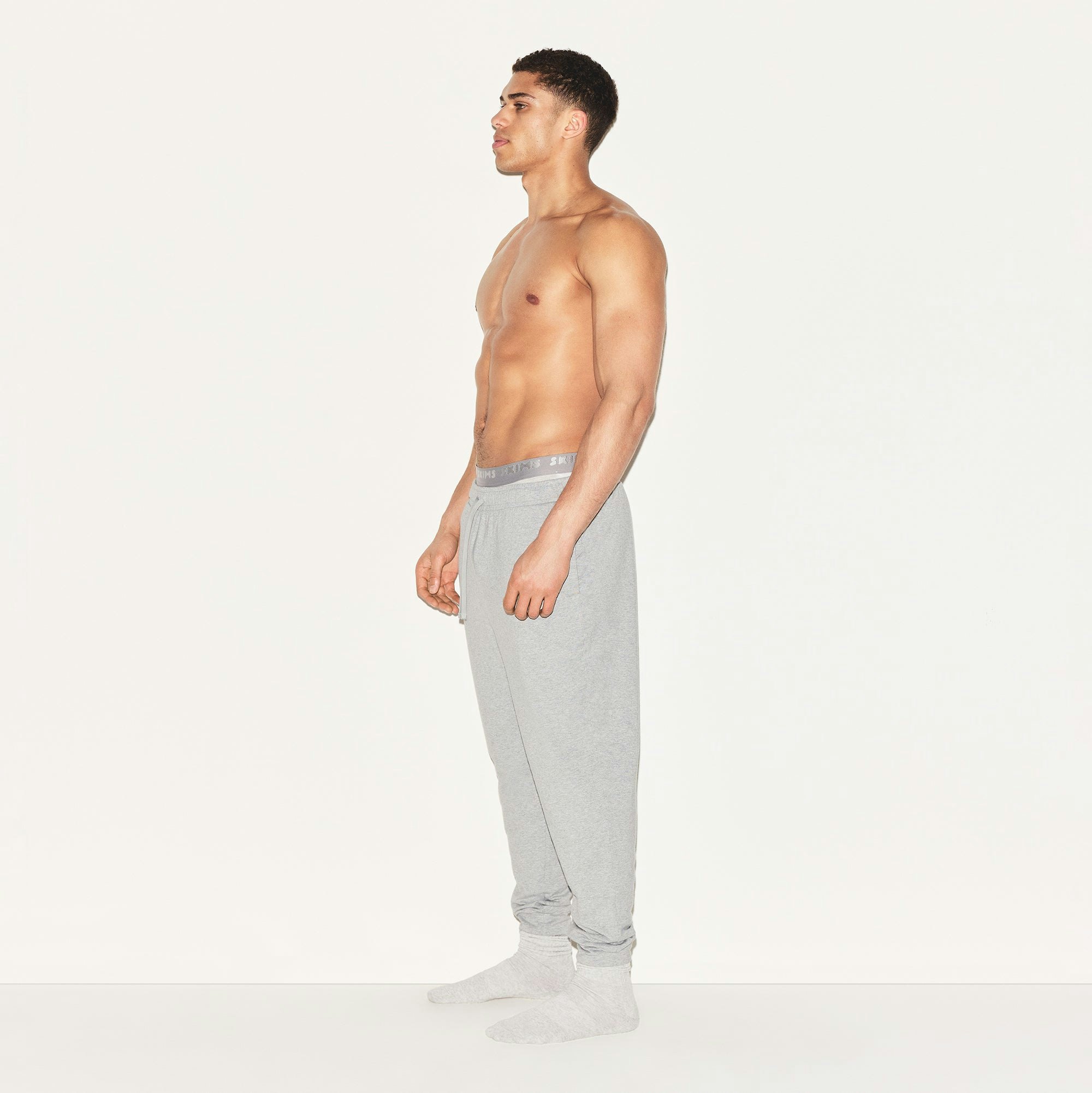 JERSEY LOUNGE MENS JOGGER | HEATHER GREY ON A MODEL SIDE VIEW | FOCUS: 0.0, 1.0, 0.9