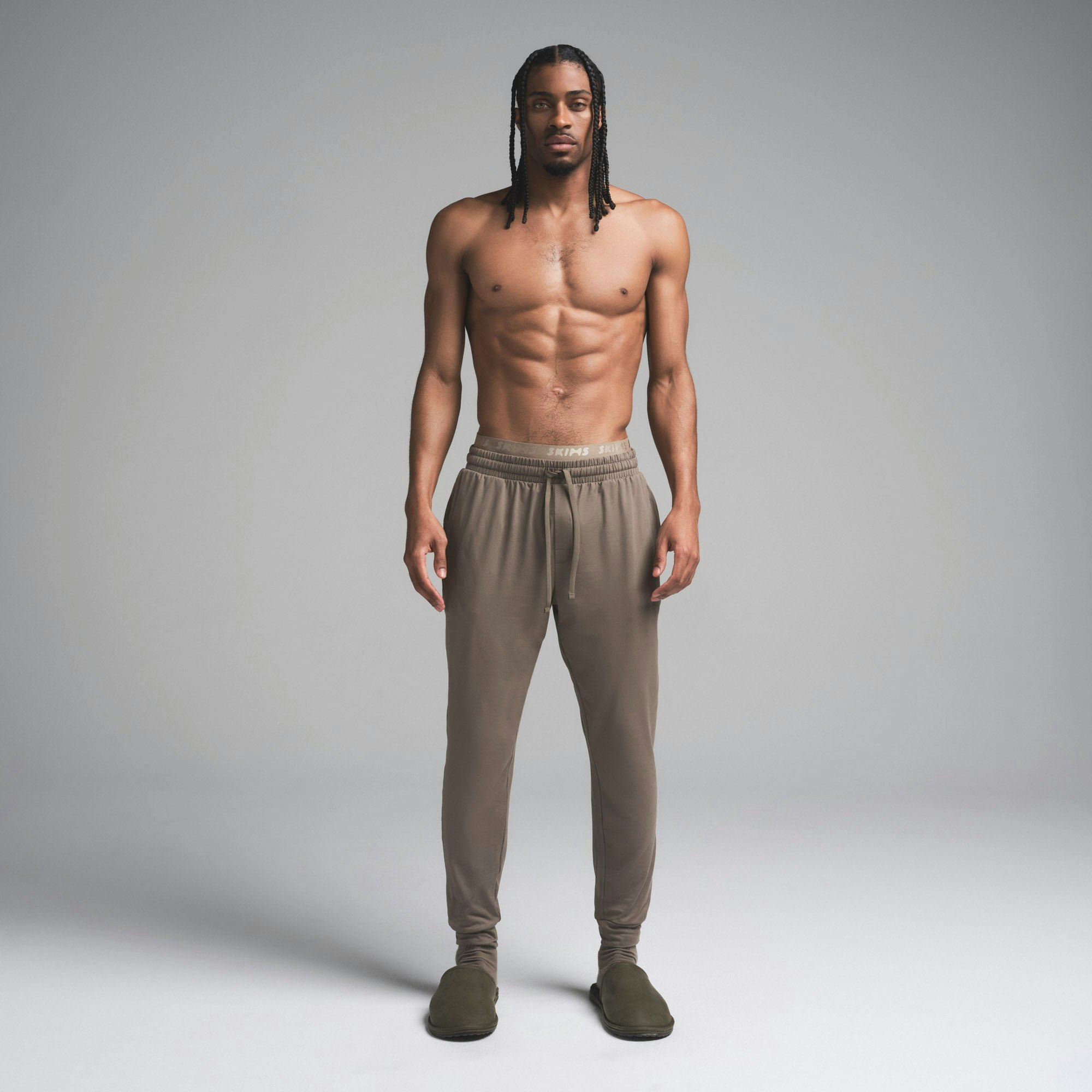 OUTDOOR JERSEY MENS TAPERED JOGGER | TRUFFLE ON A MODEL FRONT VIEW | FOCUS: 0.0, 1.0, 0.9