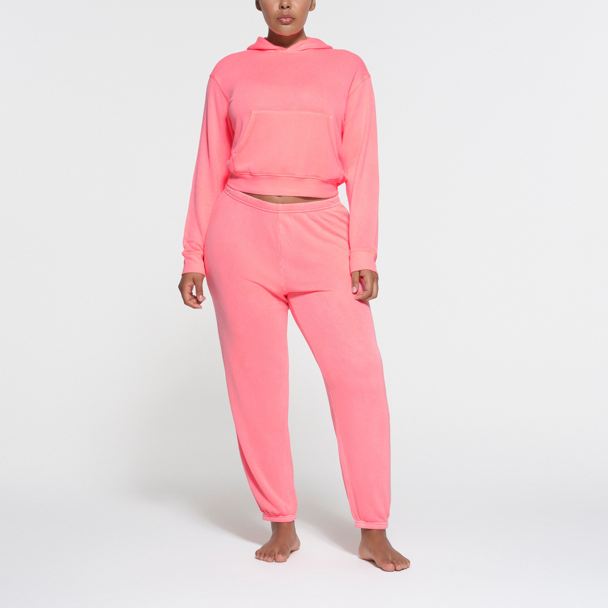 LIGHT FRENCH TERRY JOGGER | CORAL ON A MODEL FRONT VIEW