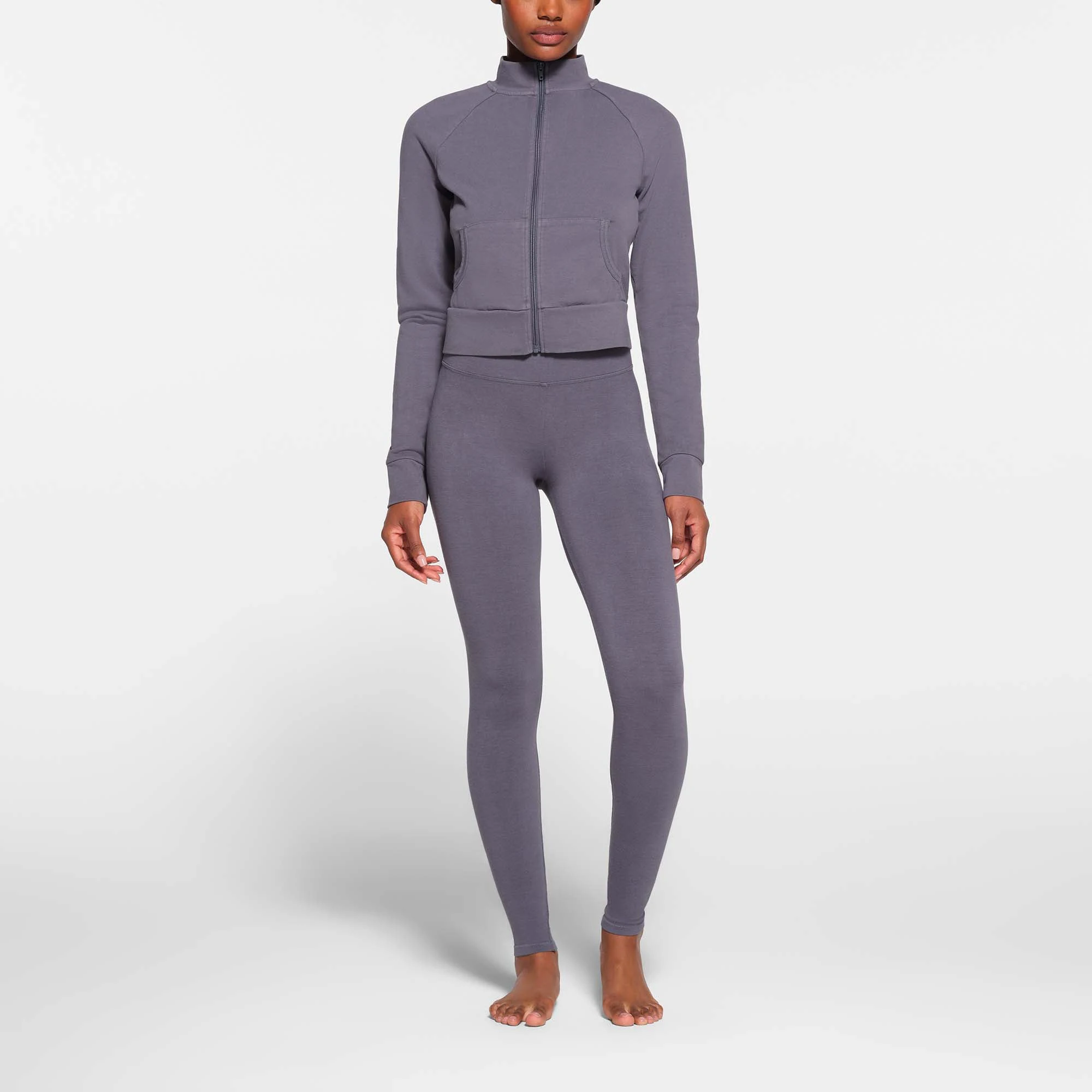 OUTDOOR HIGH-WAISTED LEGGING | STEEL BLUE ON A MODEL FRONT VIEW