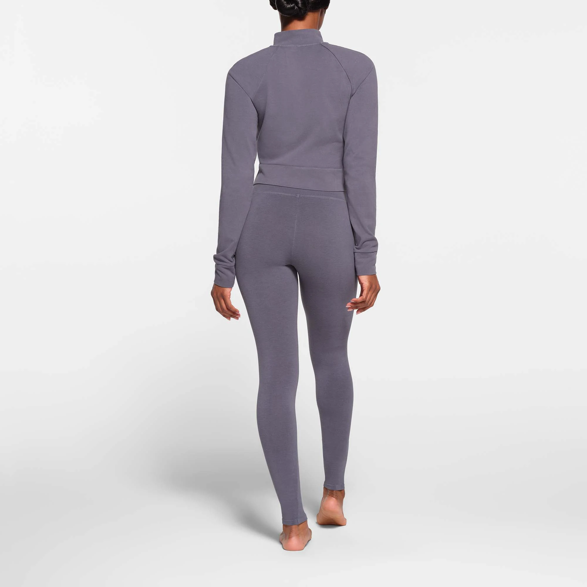 OUTDOOR HIGH-WAISTED LEGGING | STEEL BLUE ON A MODEL BACK VIEW