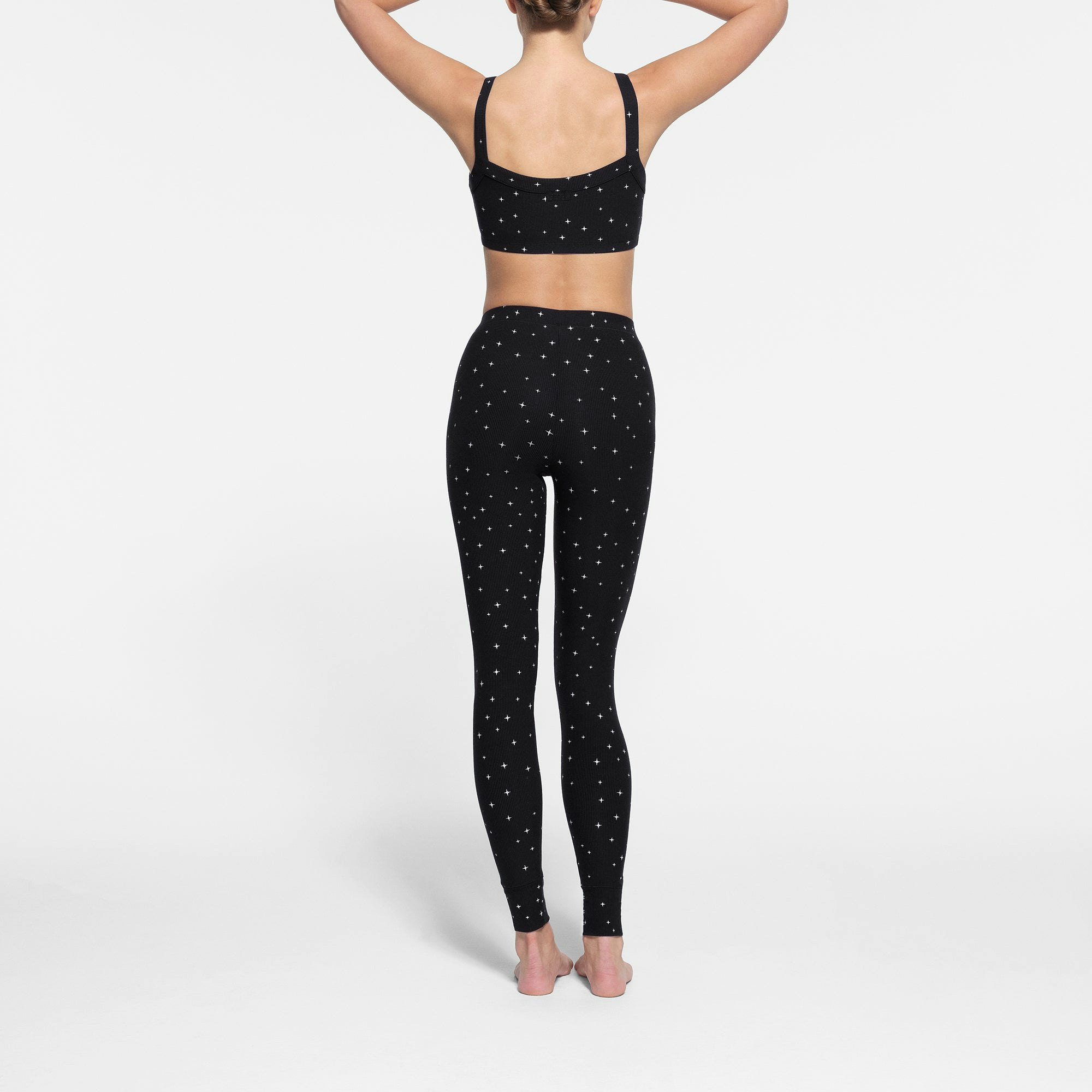 SOFT LOUNGE LEGGING WORN BY A MODEL IN BACK VIEW