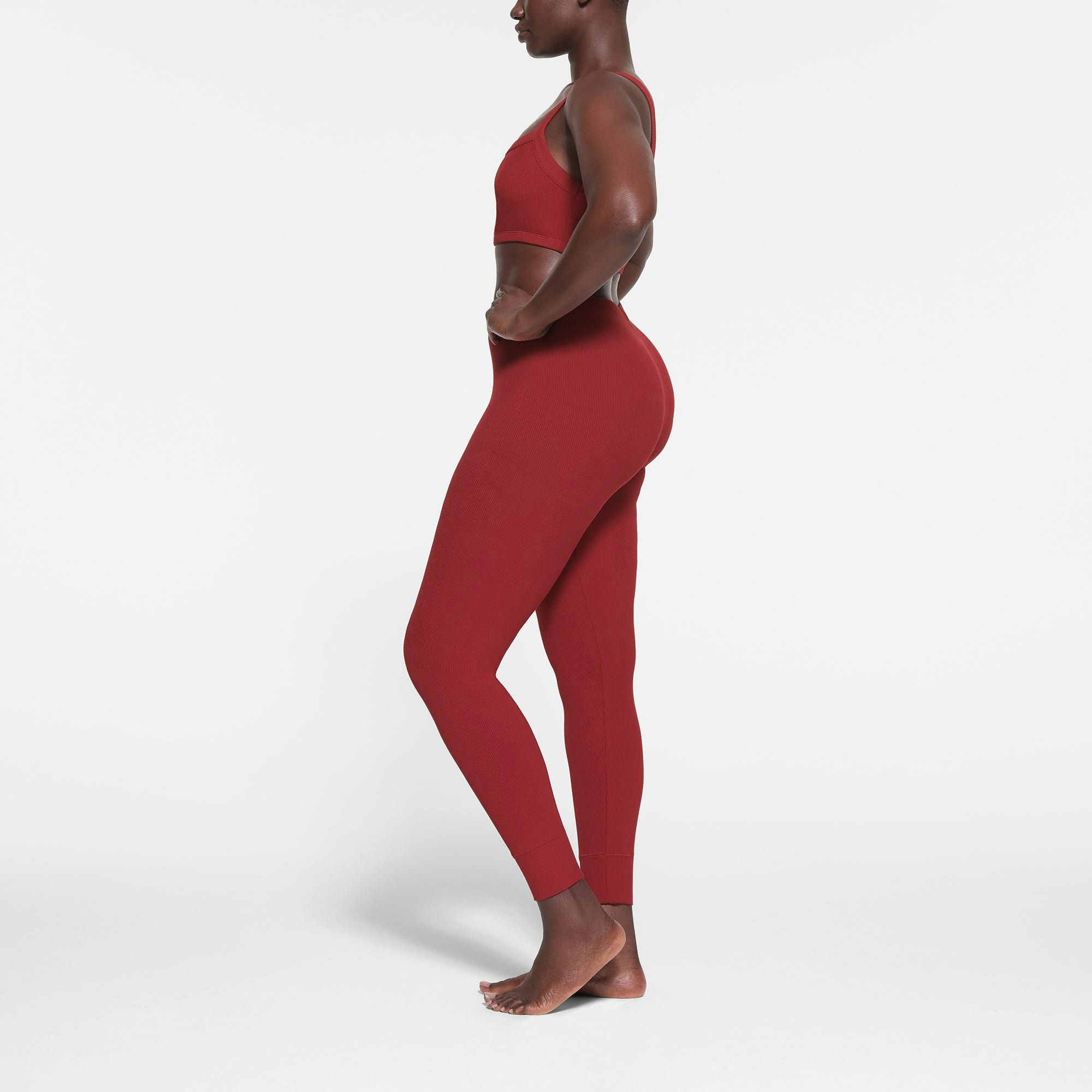 SOFT LOUNGE LEGGING WORN BY A MODEL IN SIDE VIEW
