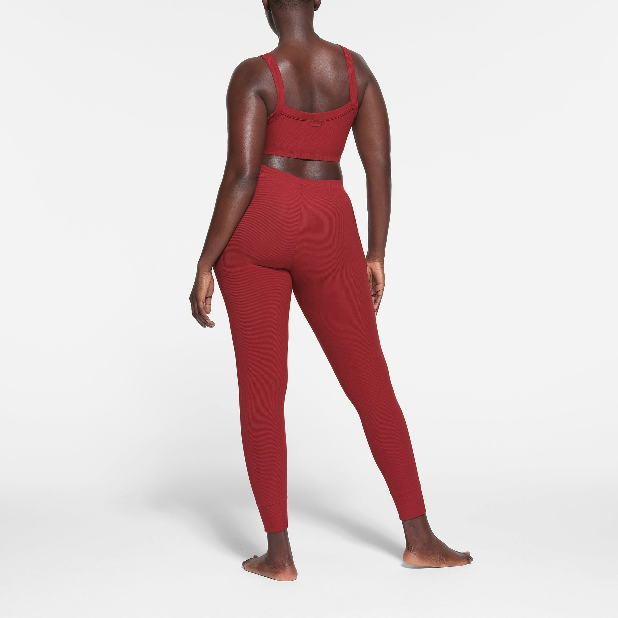 SOFT LOUNGE LEGGING WORN BY A MODEL IN BACK VIEW