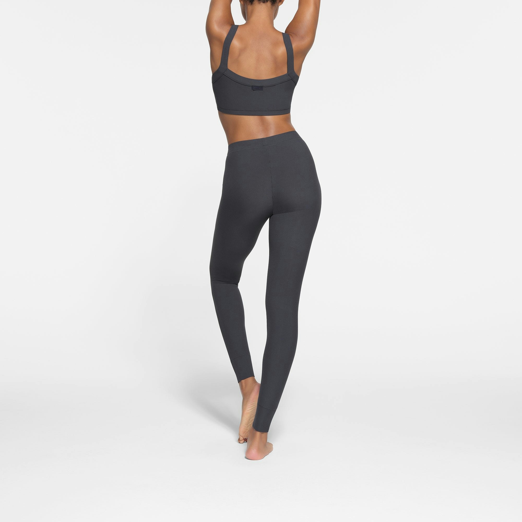 SOFT LOUNGE LEGGING WORN BY A MODEL IN BACK VIEW