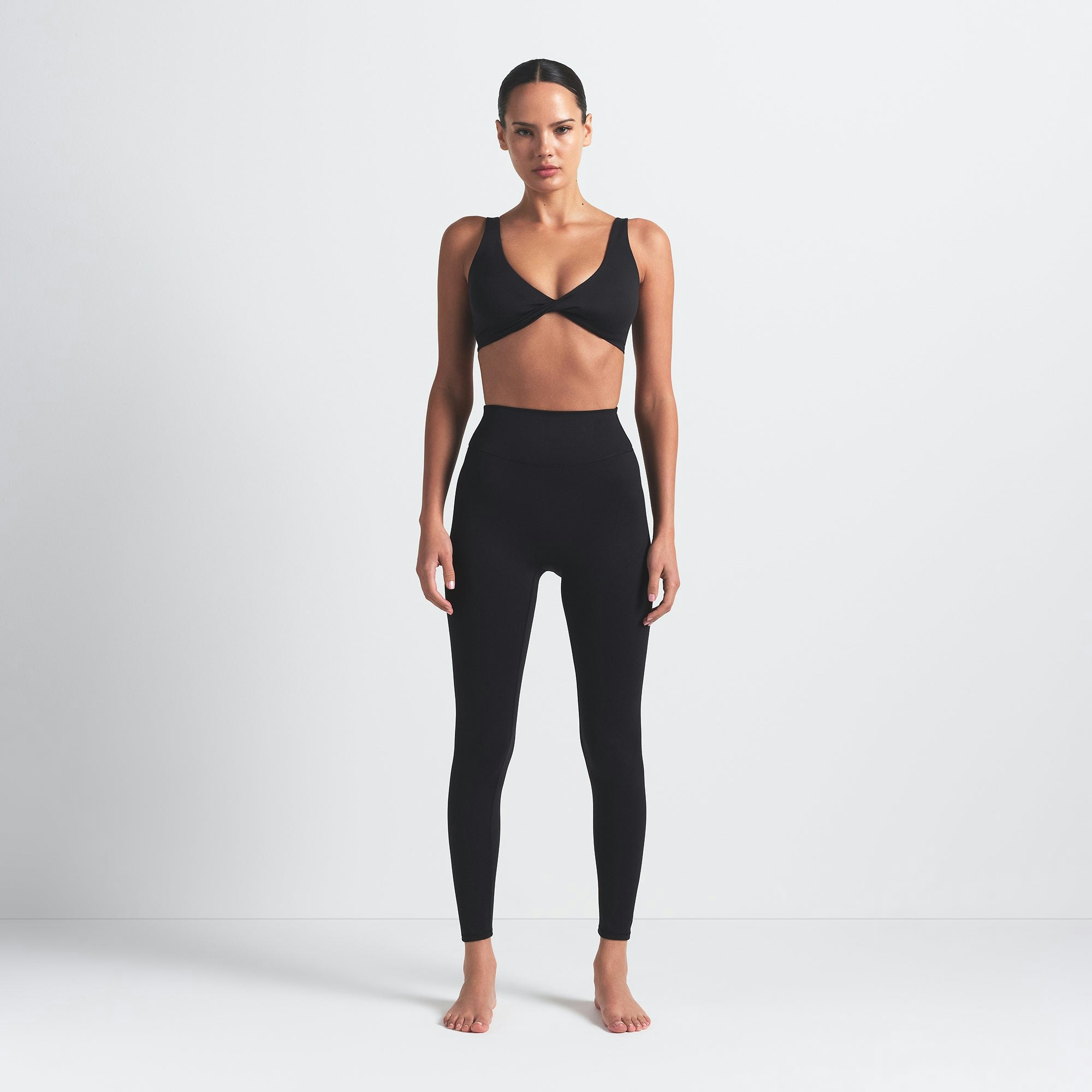 NikeSKIMS MATTE 26" LEGGING | OBSIDIAN ON A MODEL FRONT VIEW