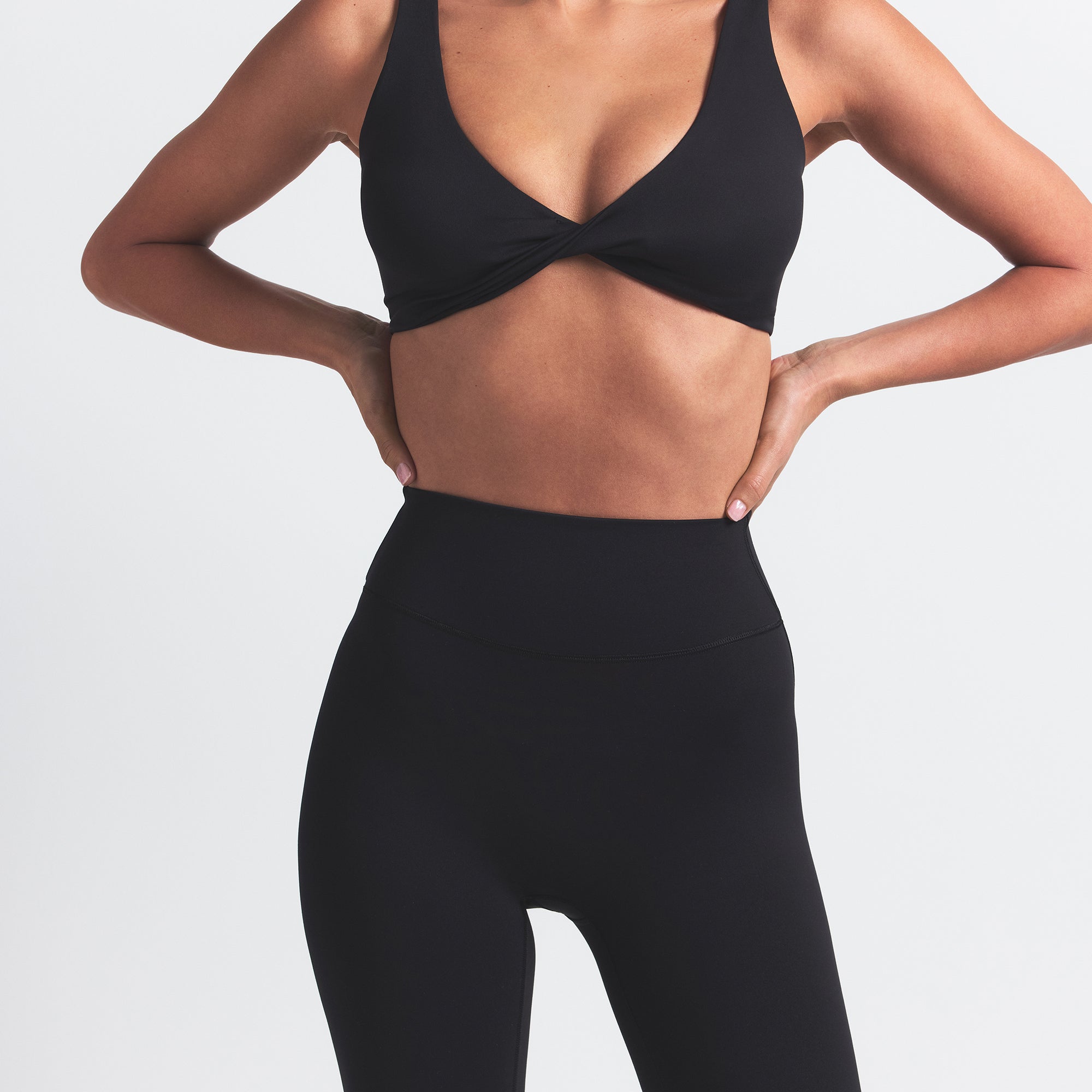 NikeSKIMS MATTE 26" LEGGING | OBSIDIAN ON A MODEL FRONT VIEW