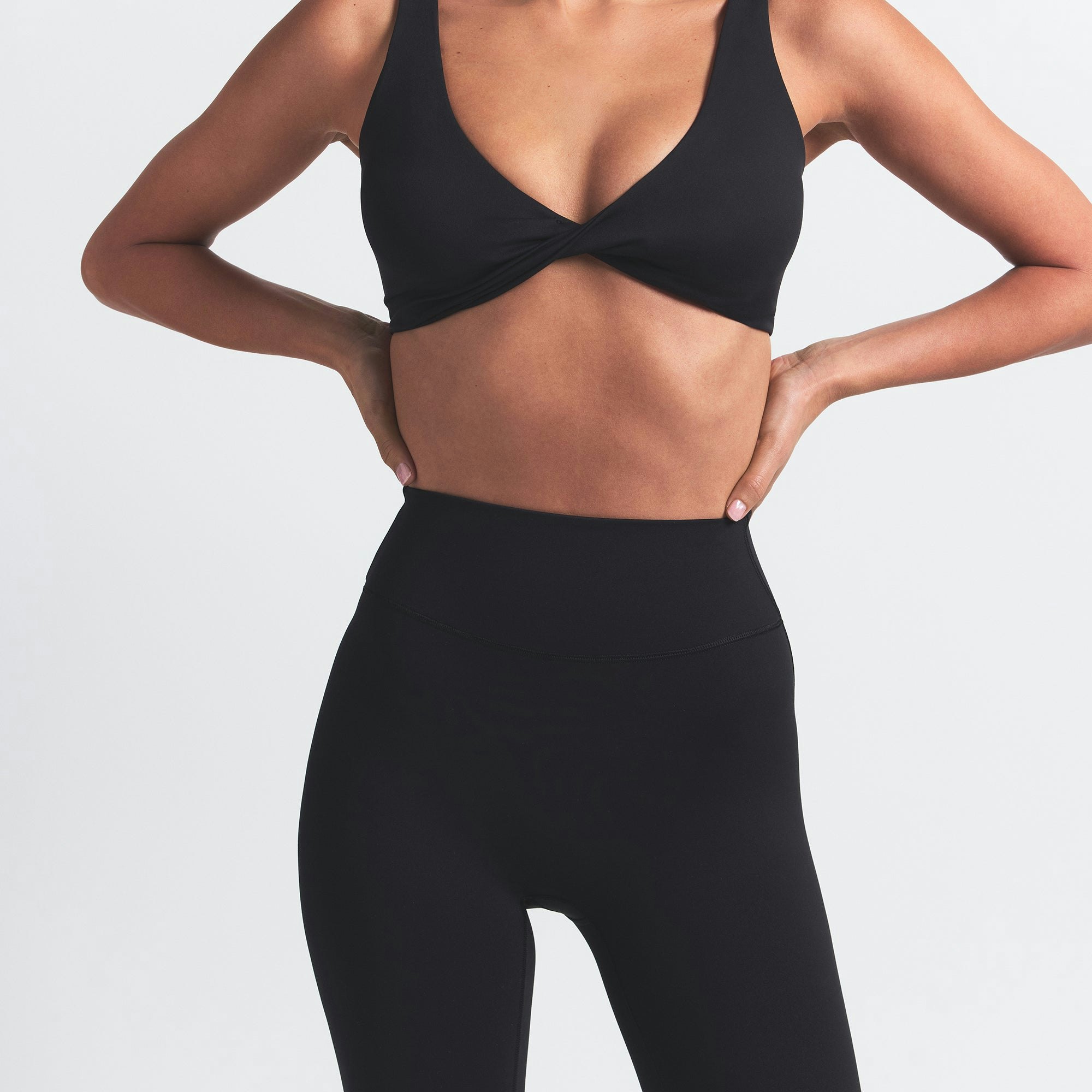 NikeSKIMS MATTE 26" LEGGING | OBSIDIAN ON A MODEL FRONT VIEW