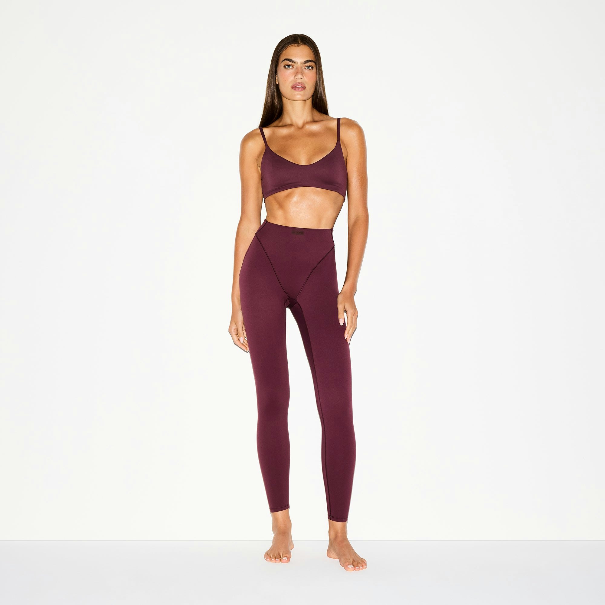 NikeSKIMS MATTE V-LINE 26" LEGGING | CURRANT ON A MODEL FRONT VIEW