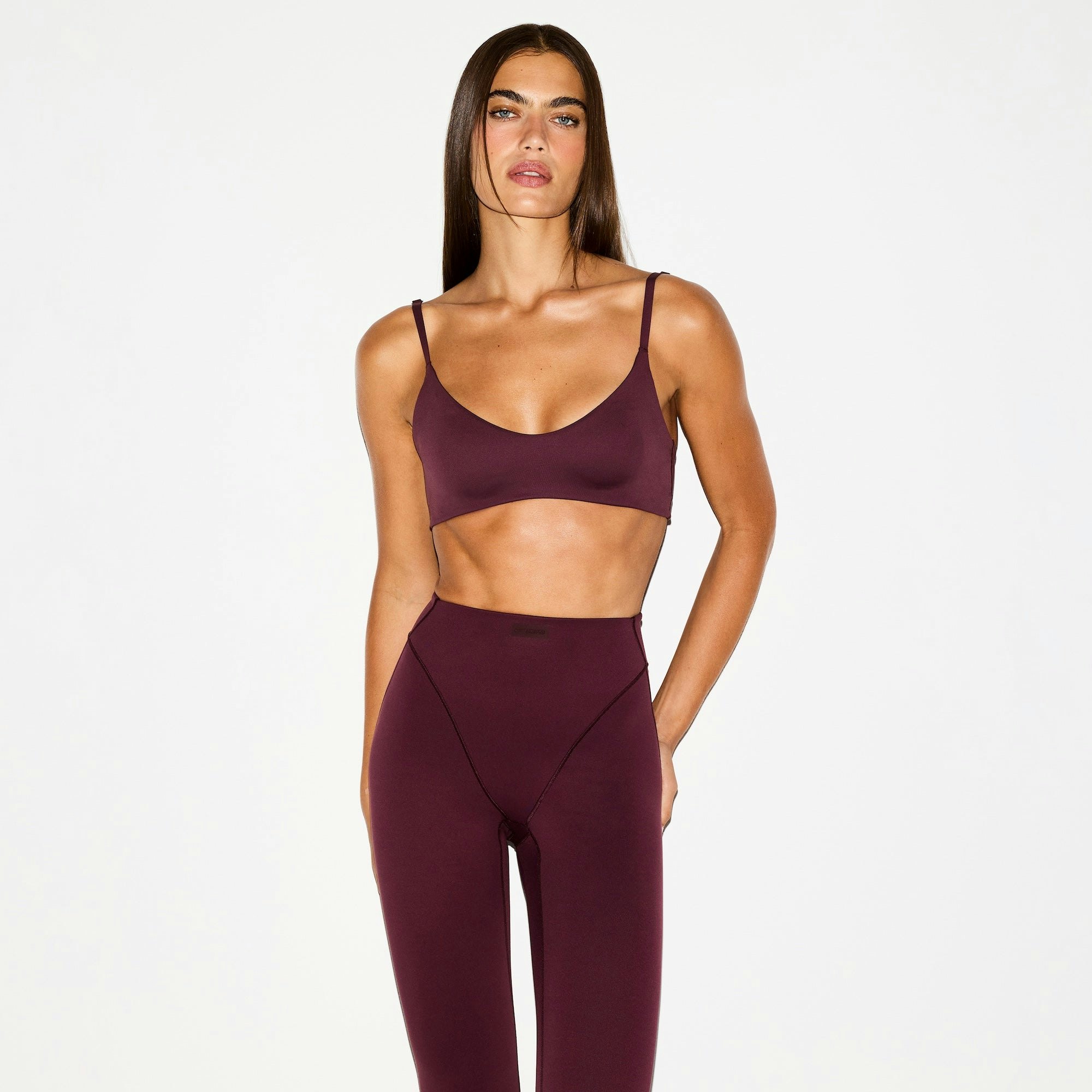 NikeSKIMS MATTE V-LINE 26" LEGGING | CURRANT ON A MODEL FRONT VIEW