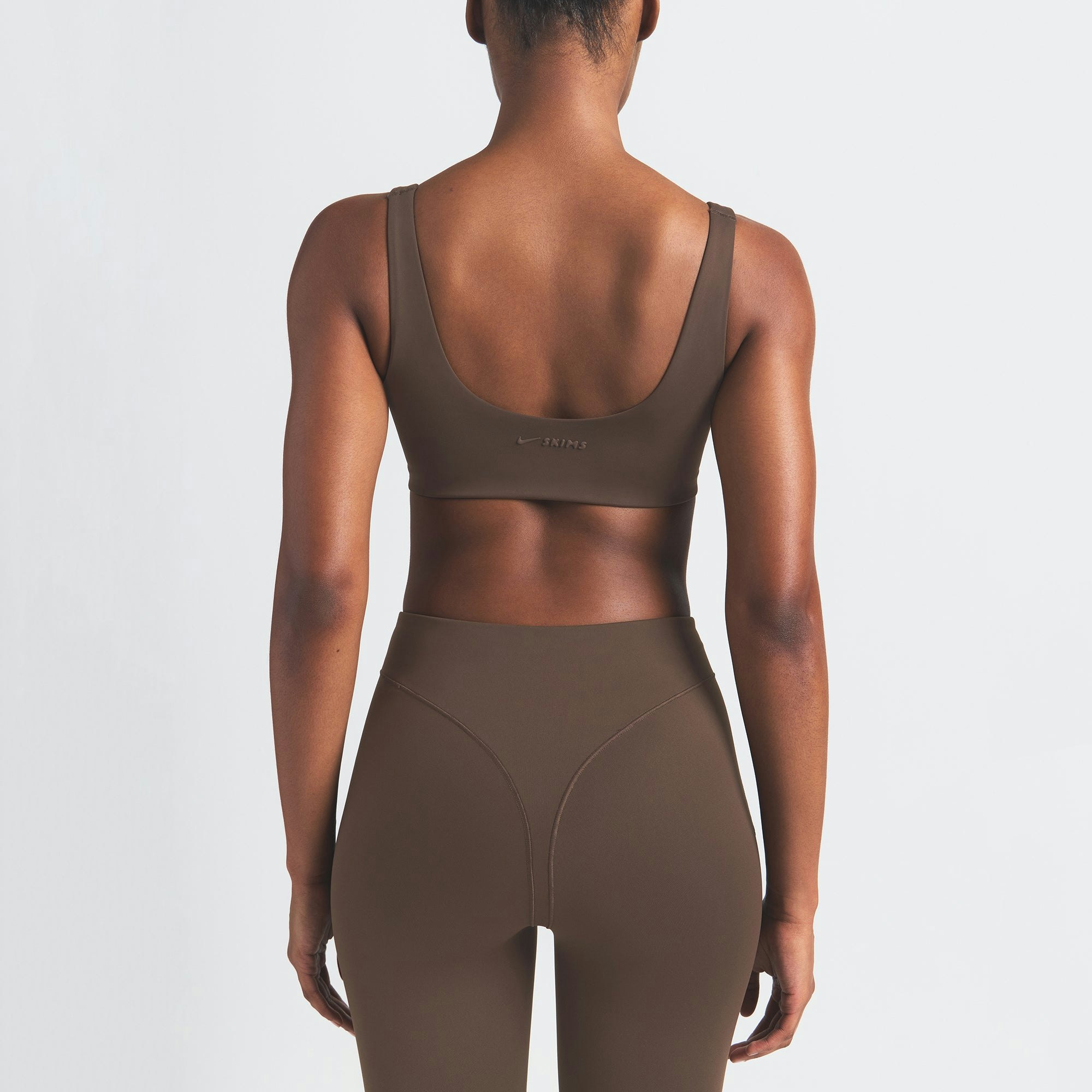 NikeSKIMS MATTE V-LINE 26" LEGGING | DARK SEPIA ON A MODEL BACK VIEW