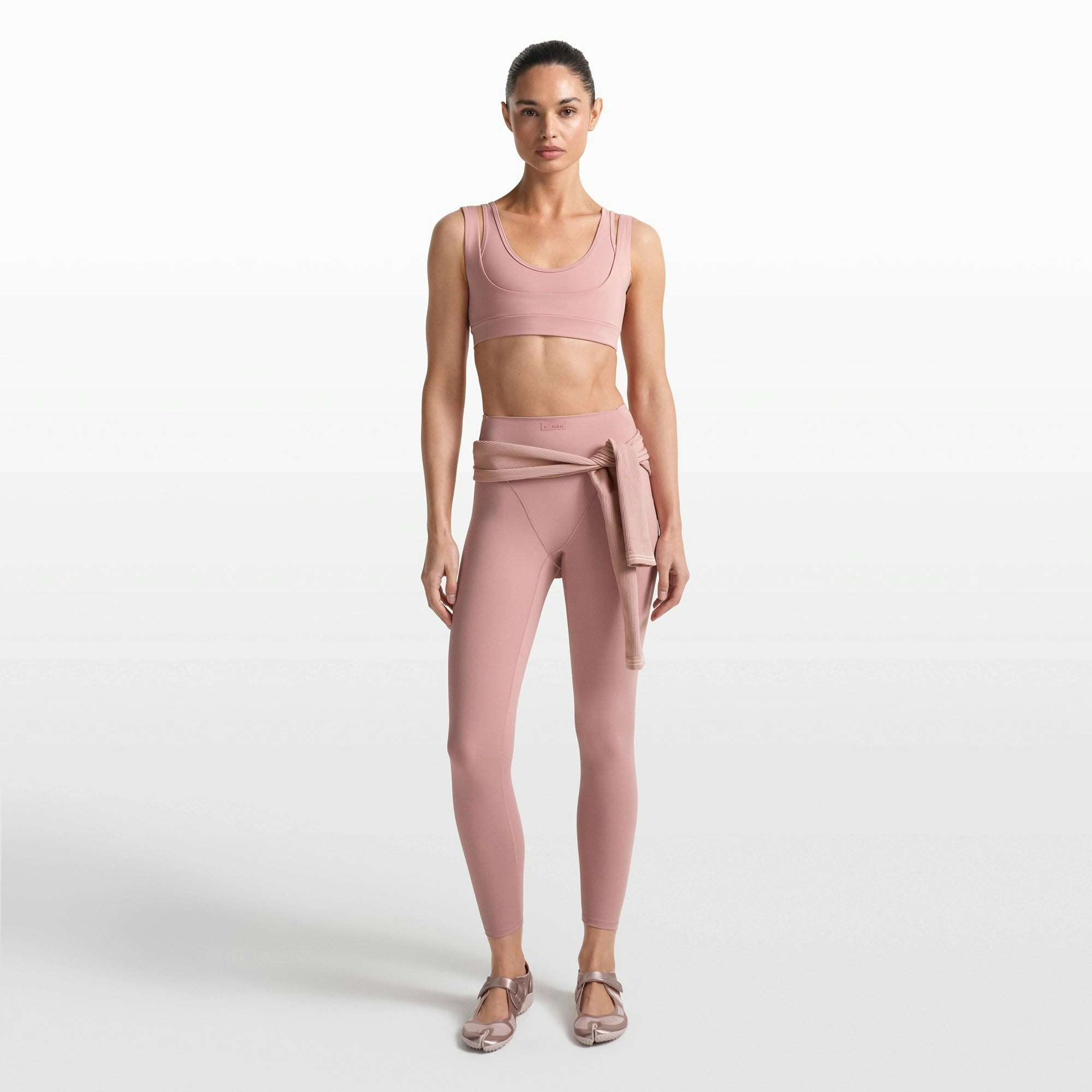 NikeSKIMS MATTE V-LINE 26" LEGGING | HIMALAYAN ON A MODEL FRONT VIEW @ | FOCUS: 0.0, 1.0, 0.9