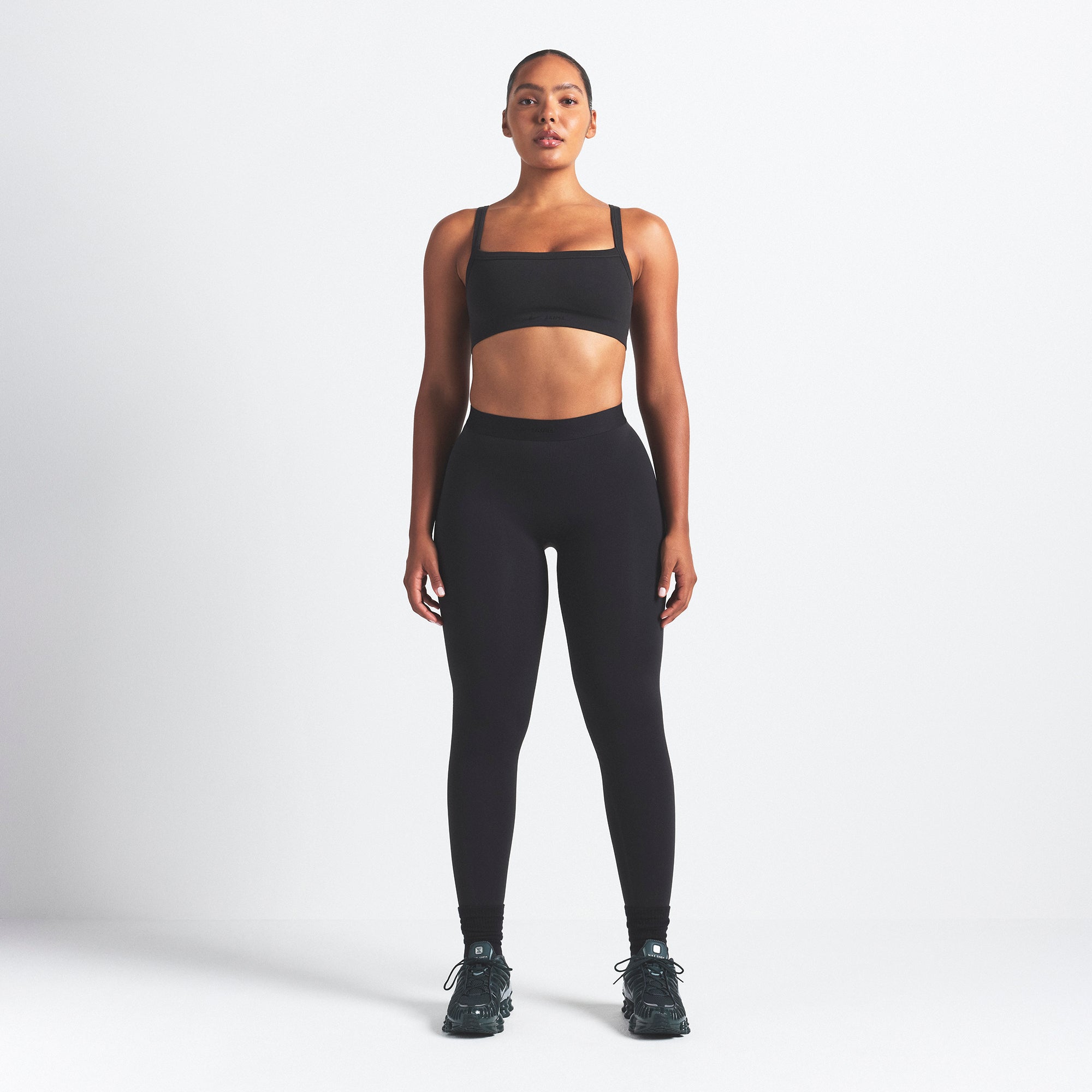 NikeSKIMS VINTAGE SEAMLESS 26" LEGGING | OBSIDIAN ON A MODEL FRONT VIEW