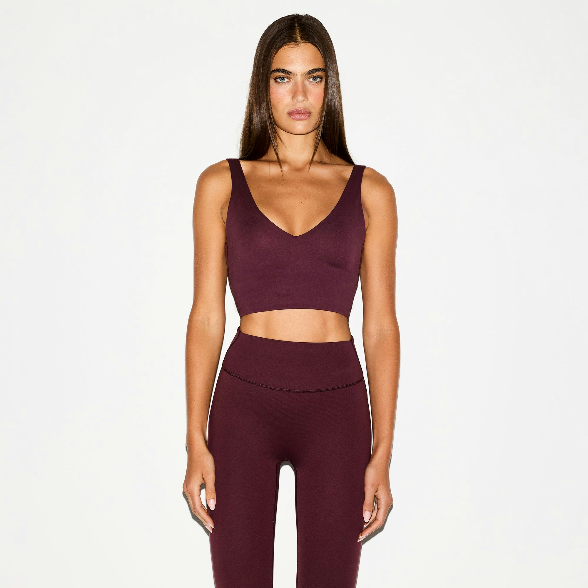 NikeSKIMS MATTE 29" LEGGING | CURRANT ON A MODEL FRONT VIEW @ | FOCUS: 0.0, 1.0, 0.9