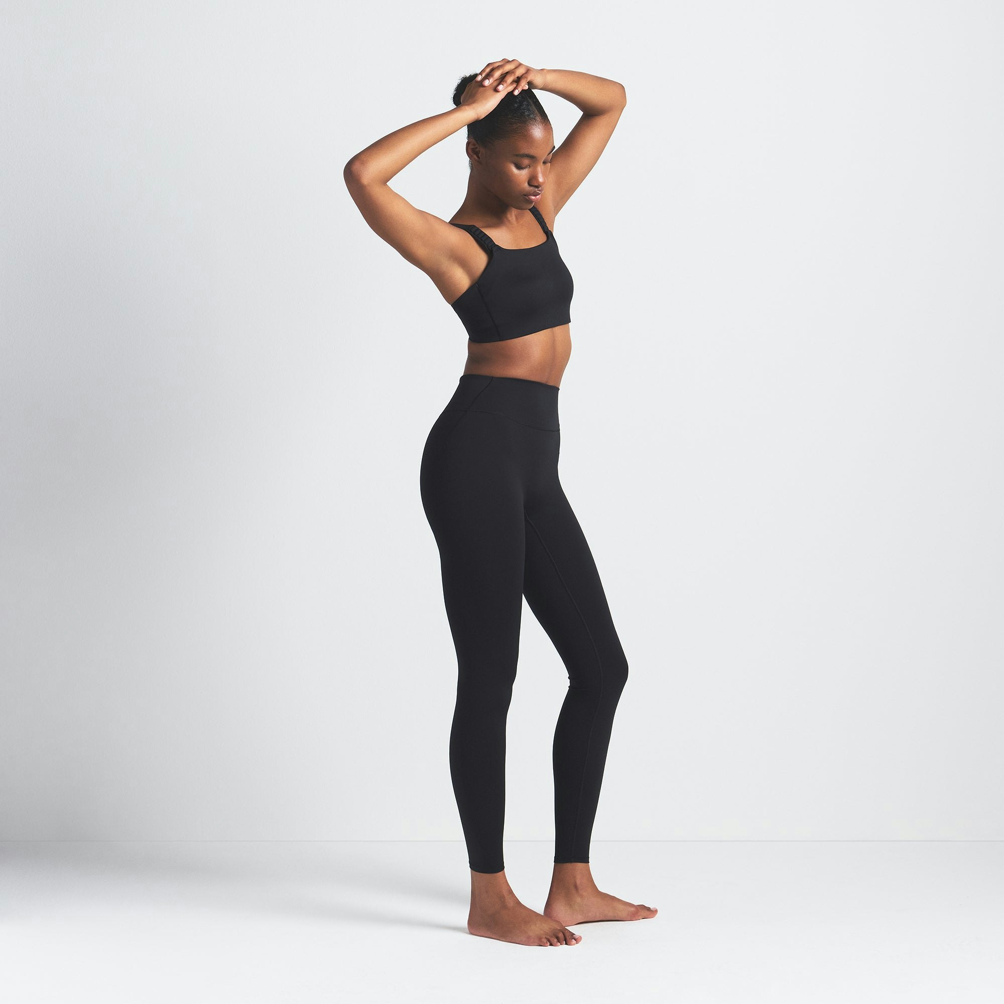 NikeSKIMS MATTE 29" LEGGING | OBSIDIAN ON A MODEL SIDE VIEW