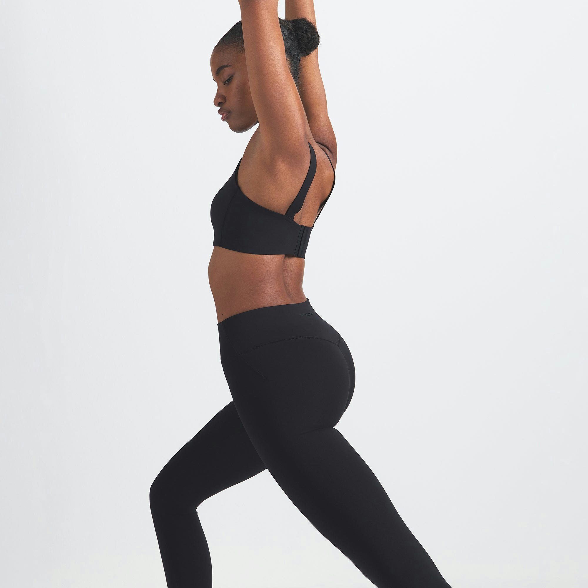 NikeSKIMS MATTE 29" LEGGING | OBSIDIAN ON A MODEL SIDE VIEW