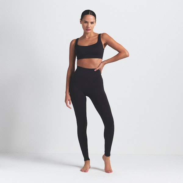 NikeSKIMS VINTAGE SEAMLESS LEGGING 26" | OBSIDIAN ON A MODEL FRONT VIEW