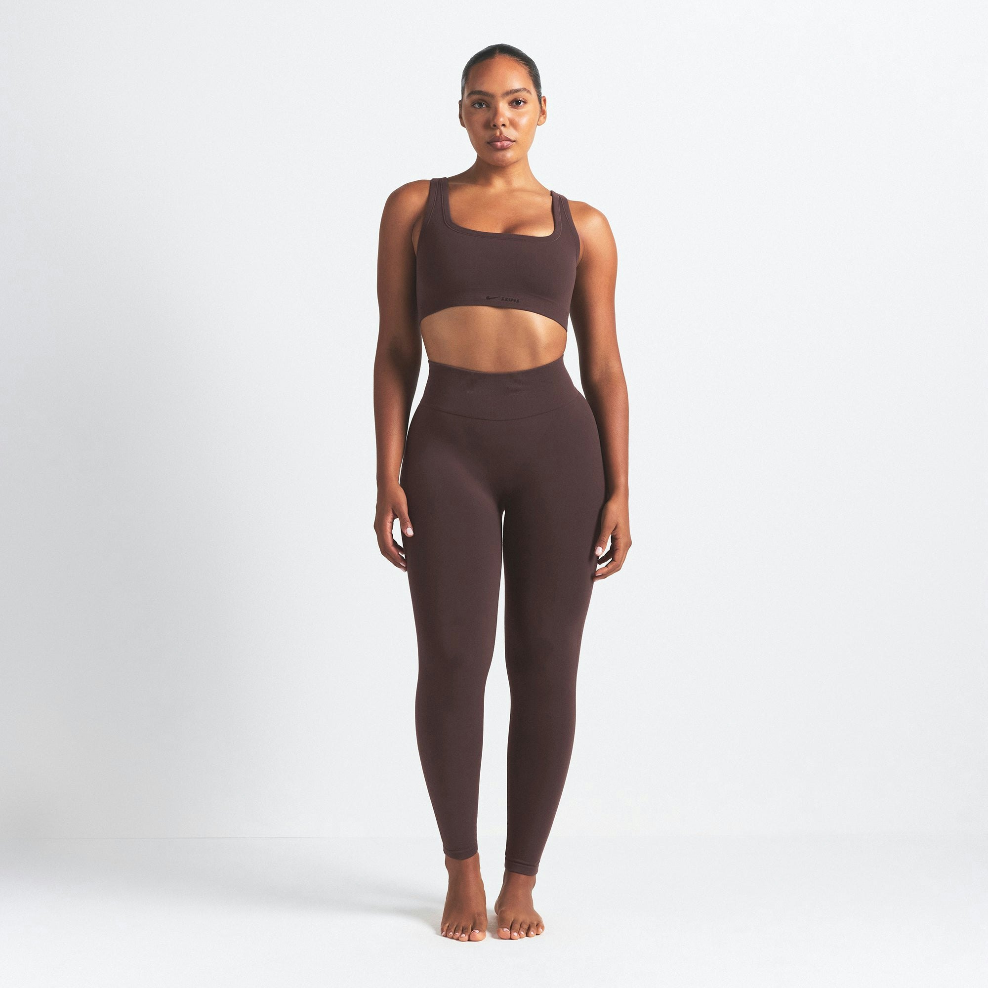 NikeSKIMS VINTAGE SEAMLESS LEGGING 26" | PHOENIX ON A MODEL FRONT VIEW