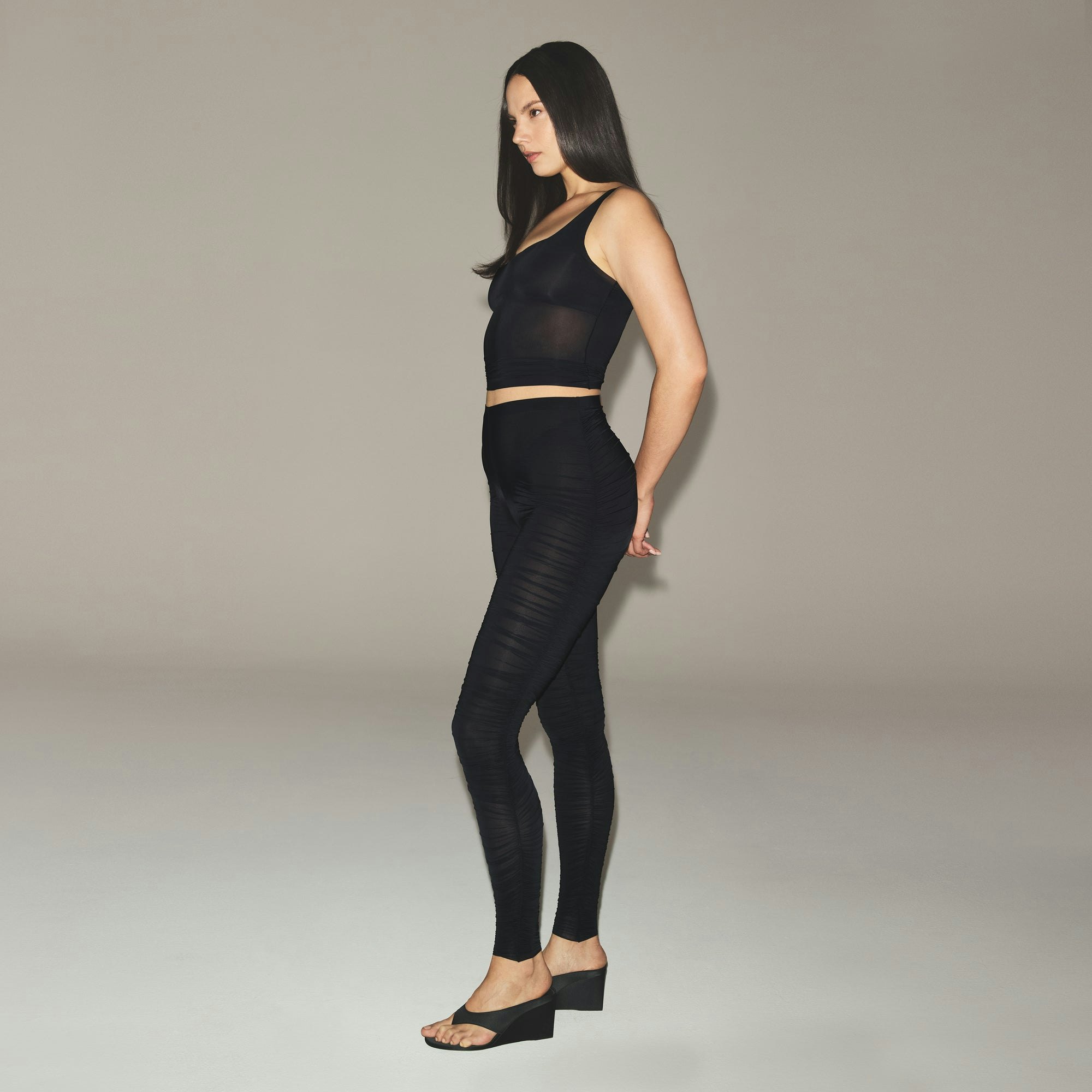 MILKY SHEER HIGH-WAISTED LEGGING | OBSIDIAN ON A MODEL FRONT VIEW | FOCUS: 0.0, 1.0, 0.9