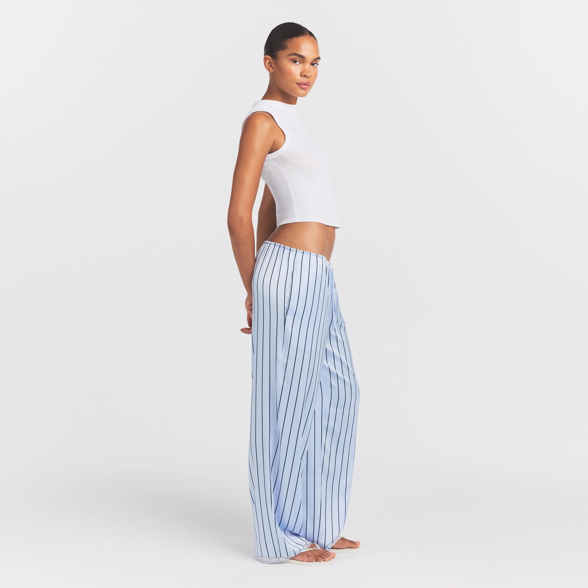 WOVEN SHINE LACE PANT | PERIWINKLE WIDE STRIPE ON A MODEL FRONT VIEW @ | FOCUS: 0.0, 1.0, 0.9